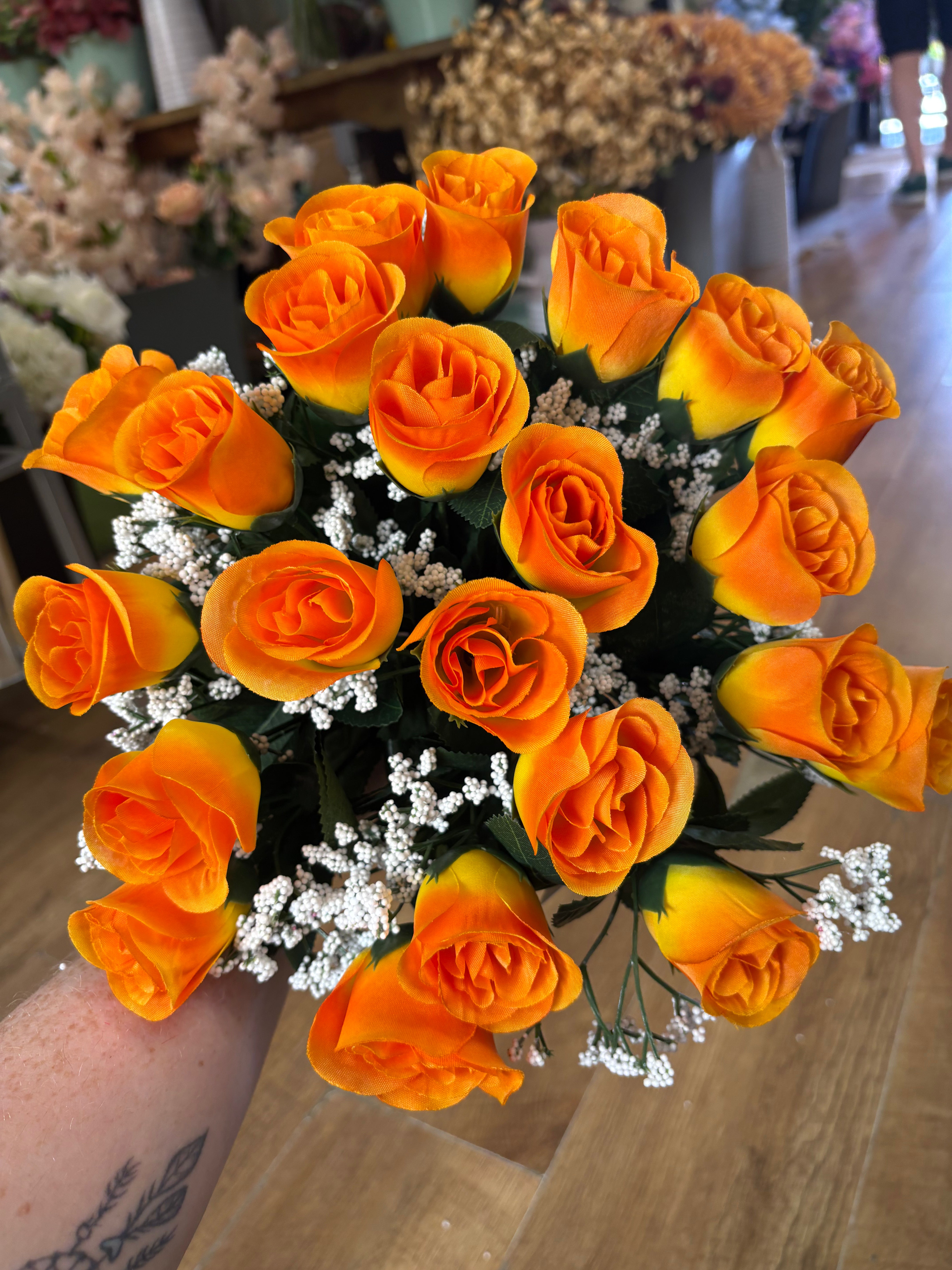 Large 22 head orange rosebud and gypsophila bouquet