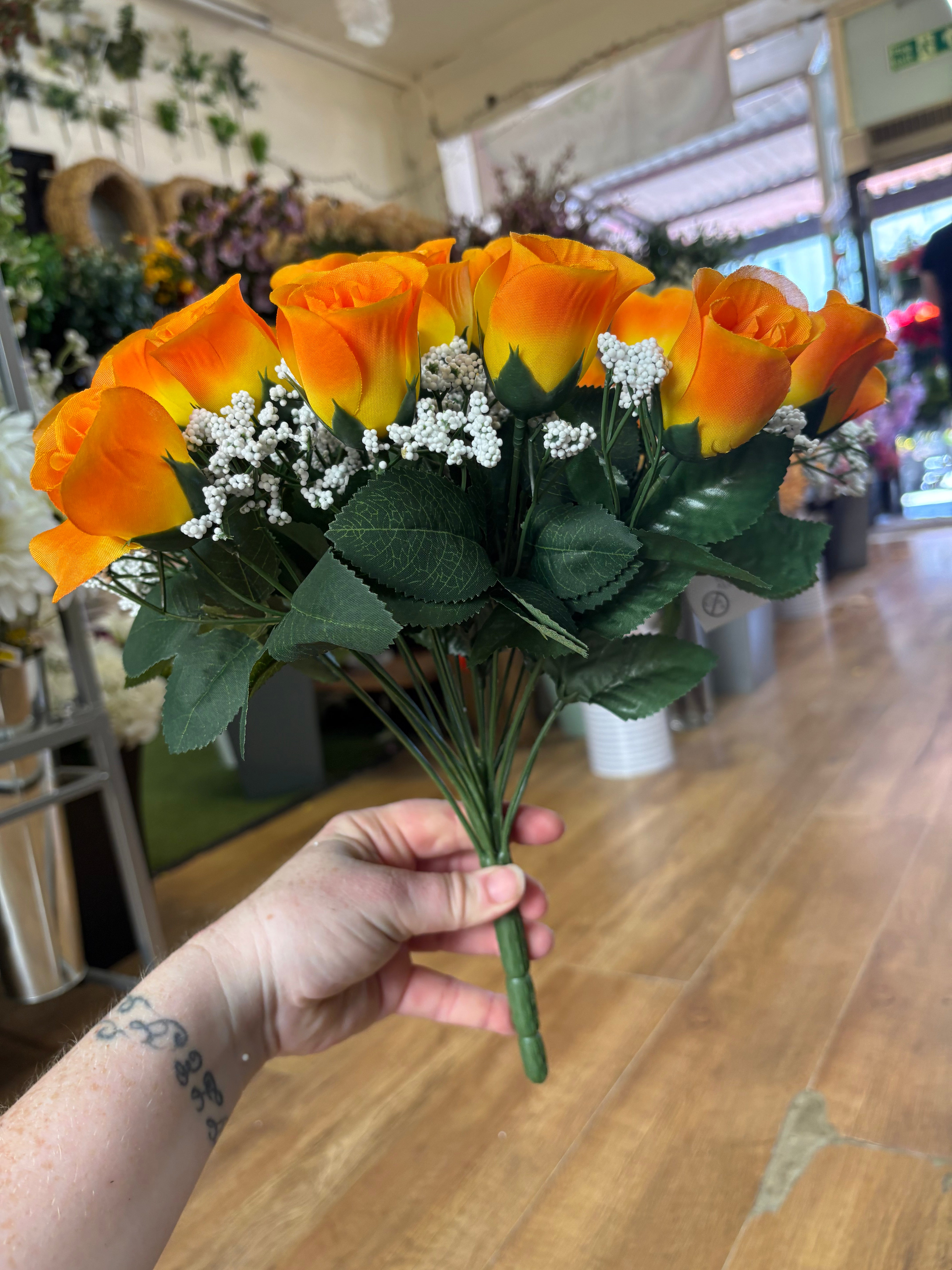 Large 22 head orange rosebud and gypsophila bouquet