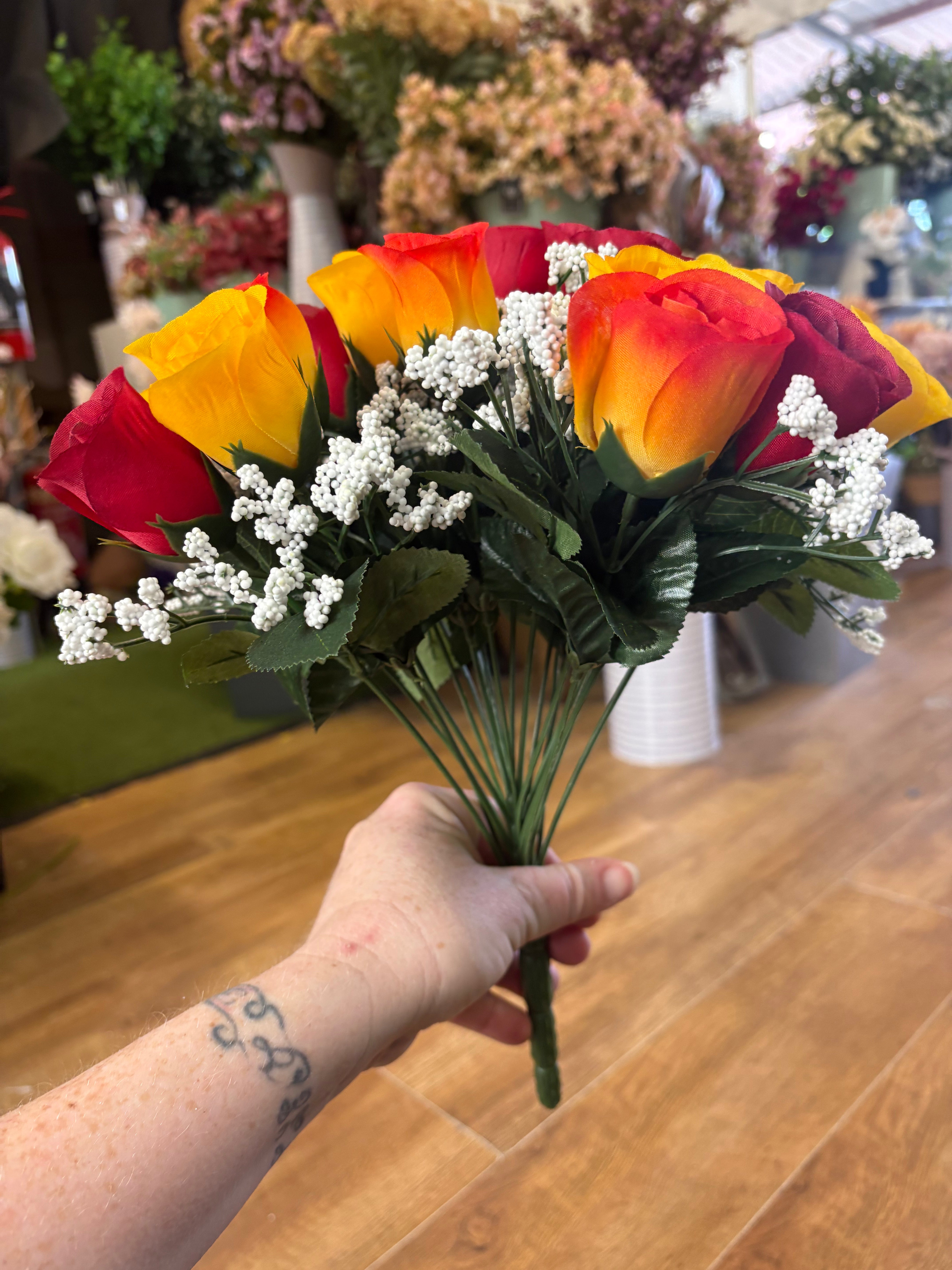 Large 22 head red, orange and yellow rosebud and gypsophila bouquet