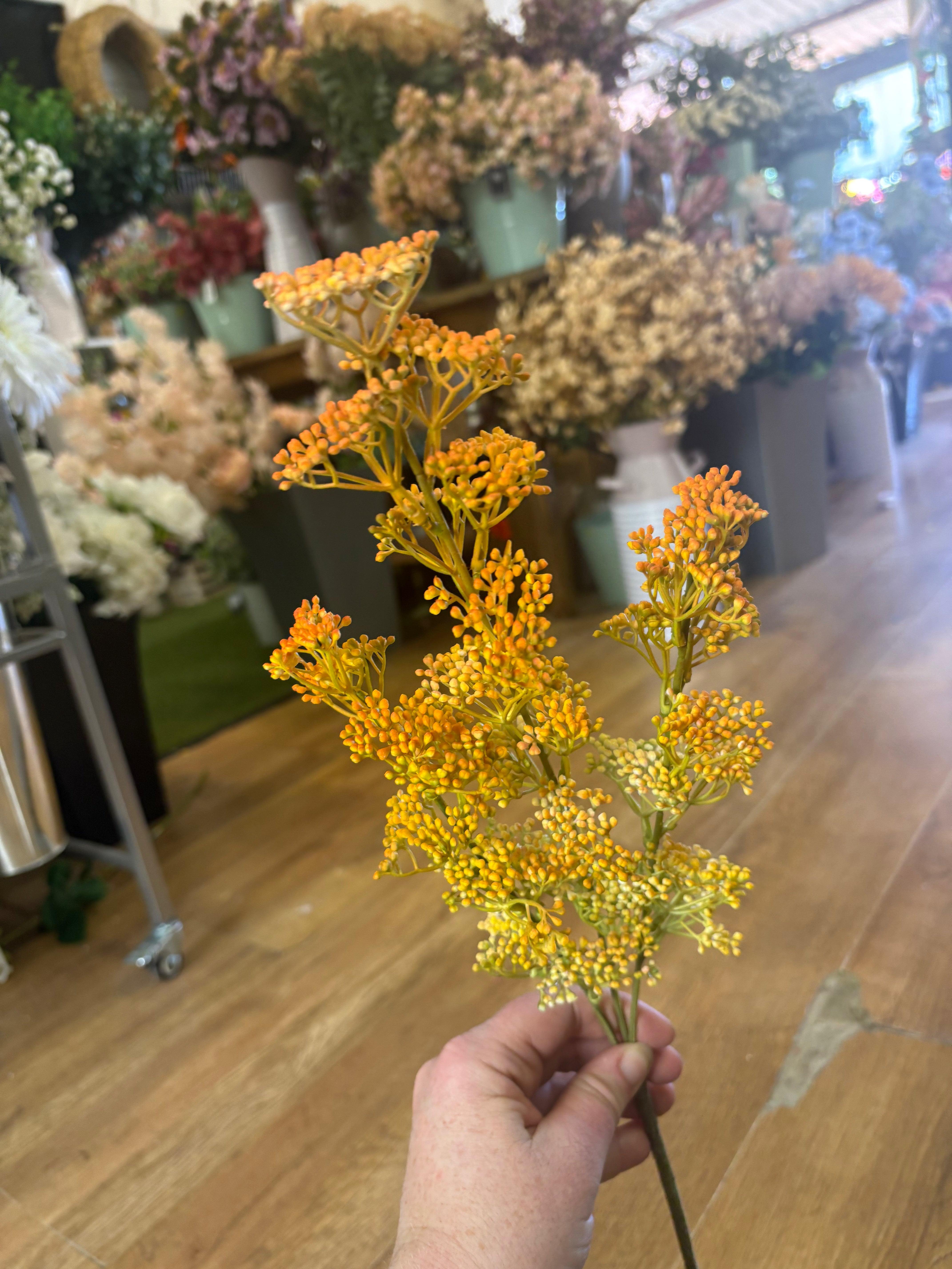 Long stem autumnal yellow and orange mini bud spray