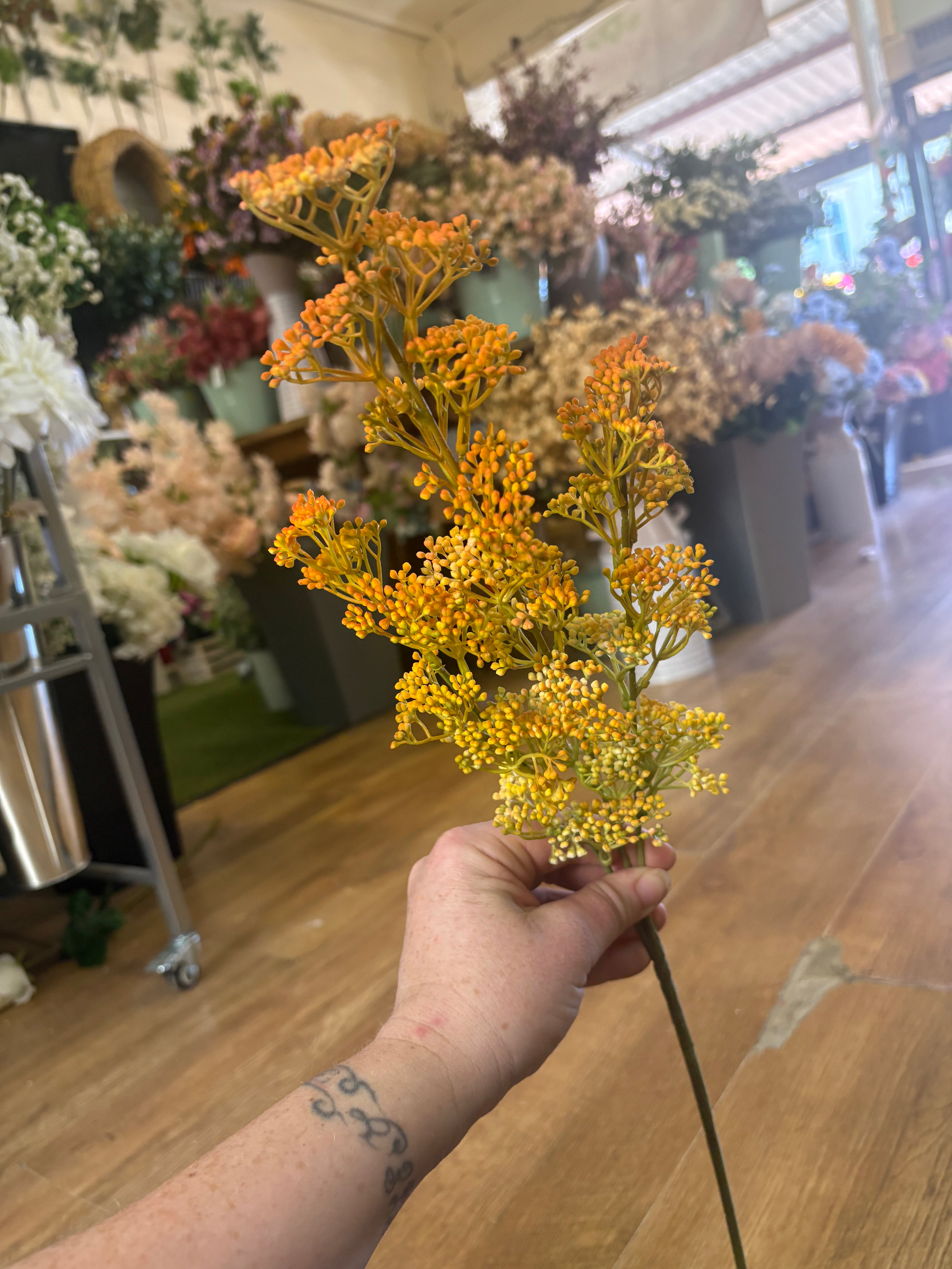 Long stem autumnal yellow and orange mini bud spray