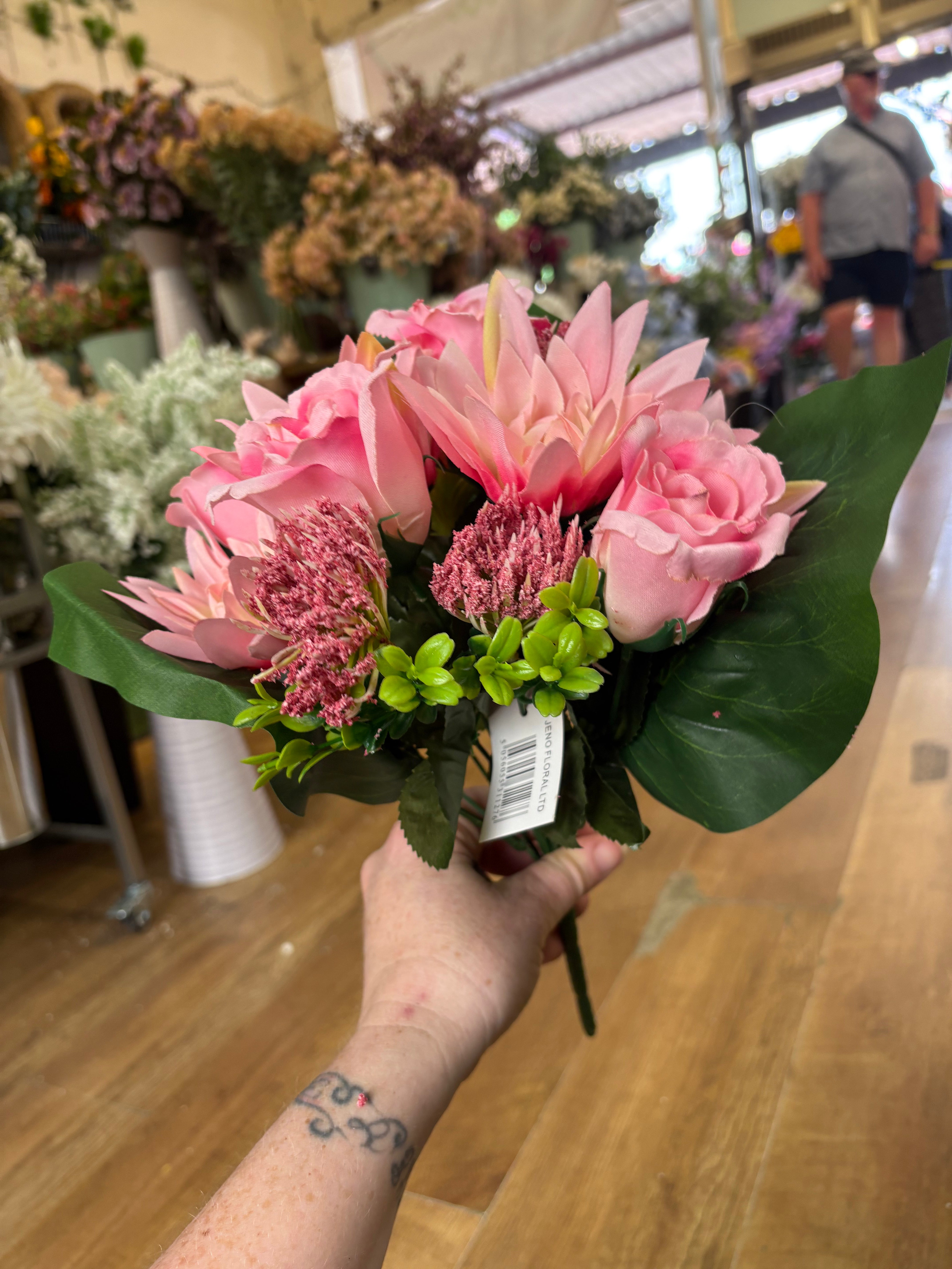 Pink dahlia, rose and flocked protea bouquet
