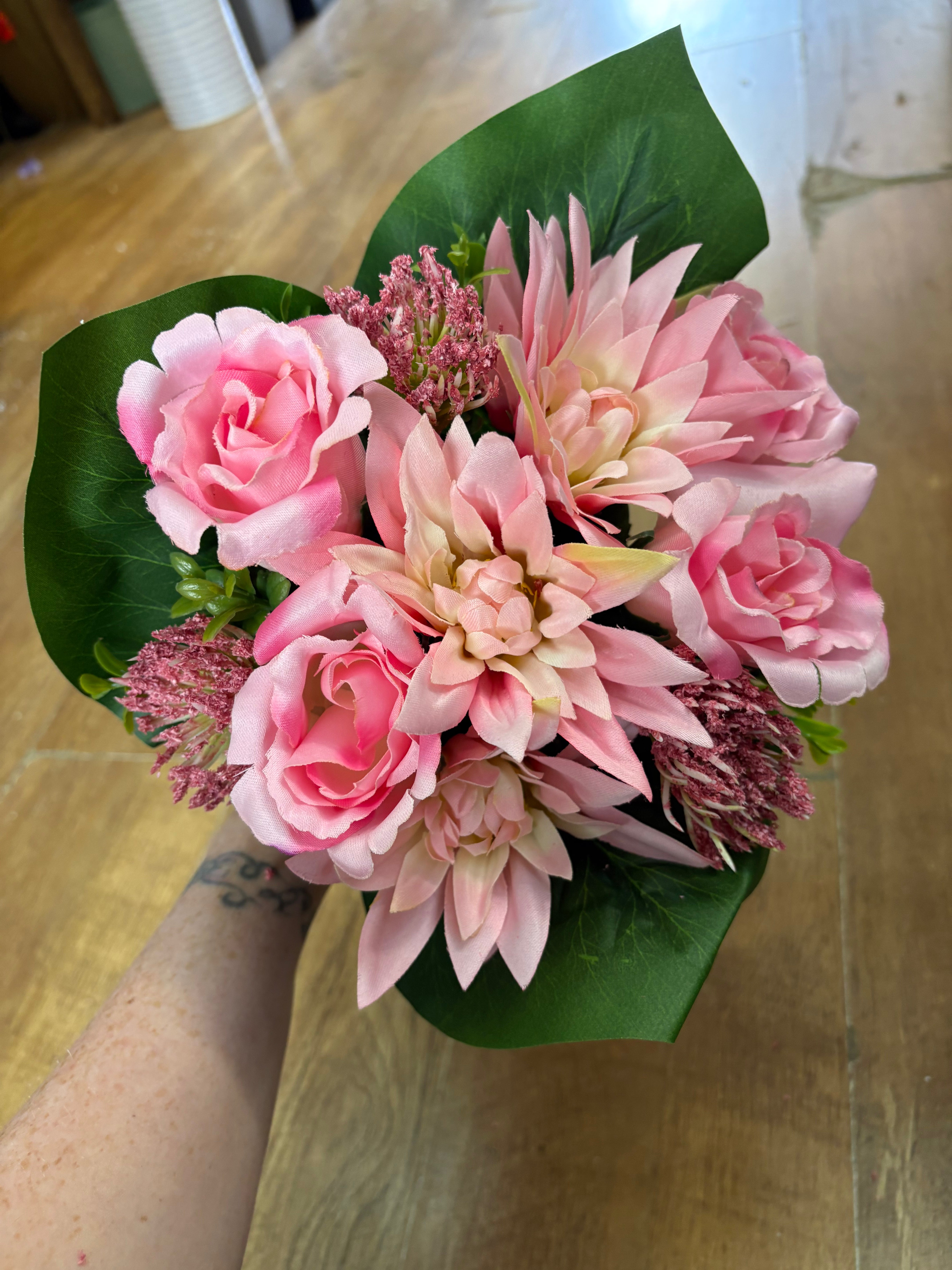 Pink dahlia, rose and flocked protea bouquet
