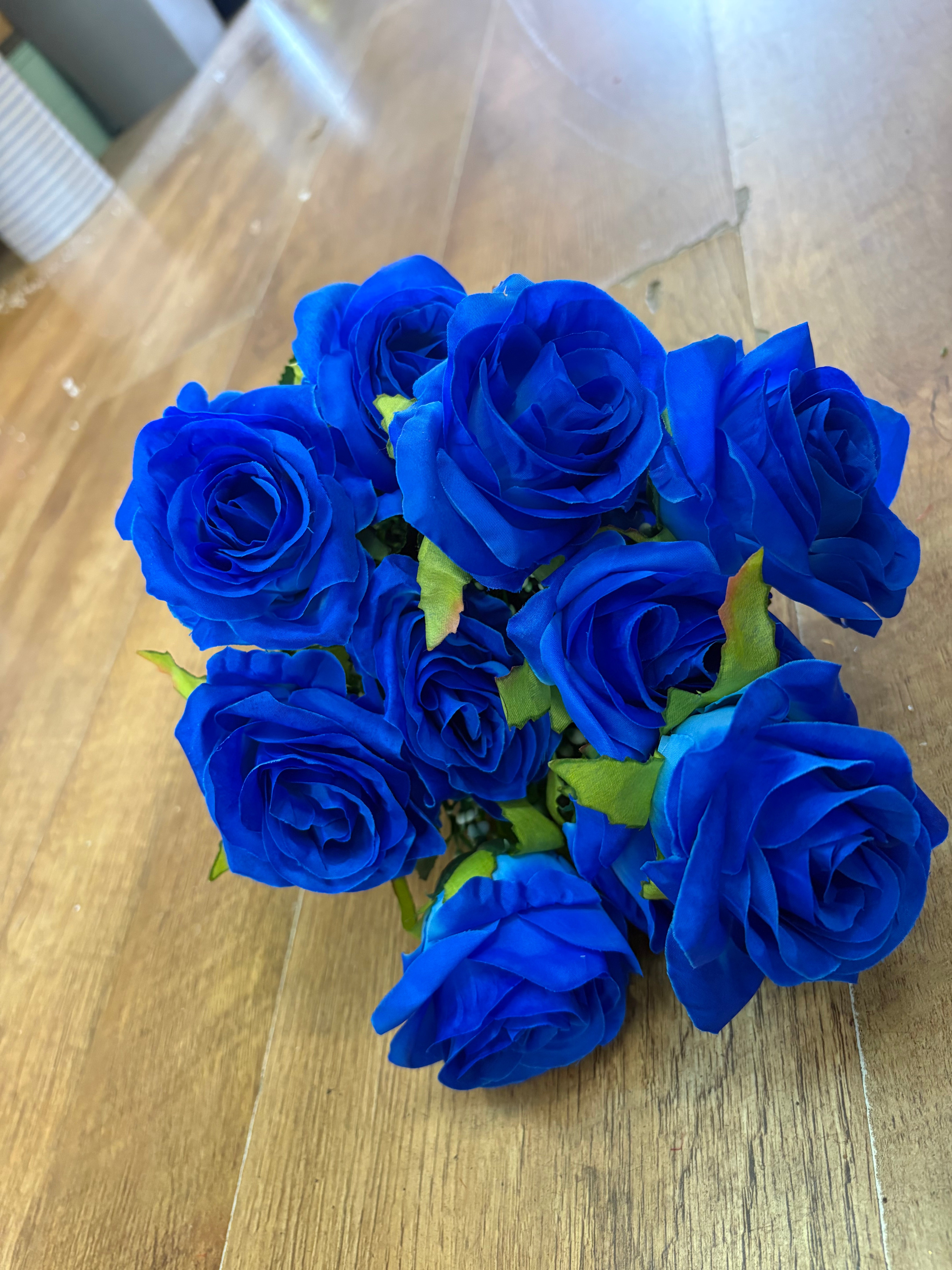 Bright blue 12 head rose bouquet