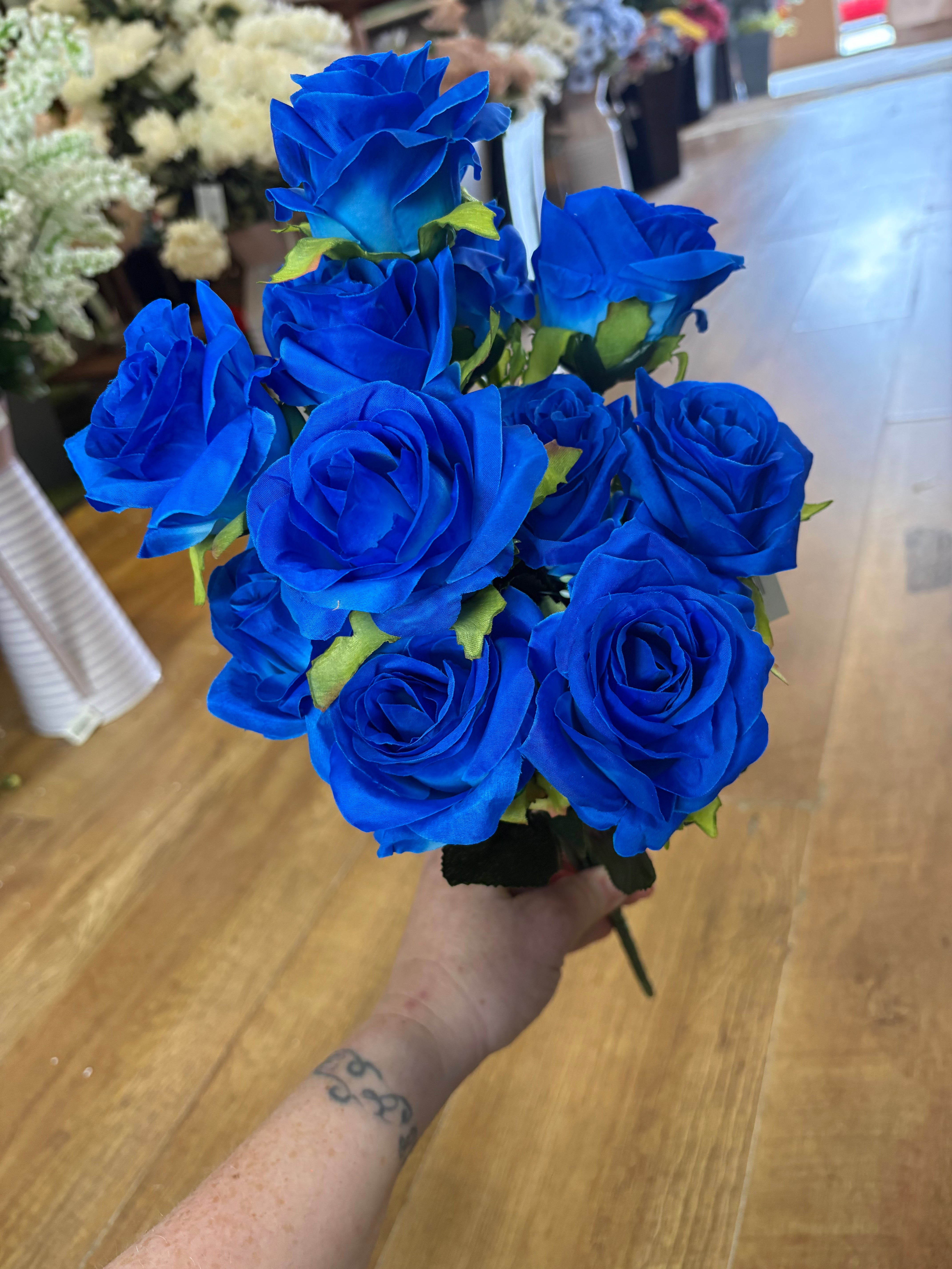 Bright blue 12 head rose bouquet