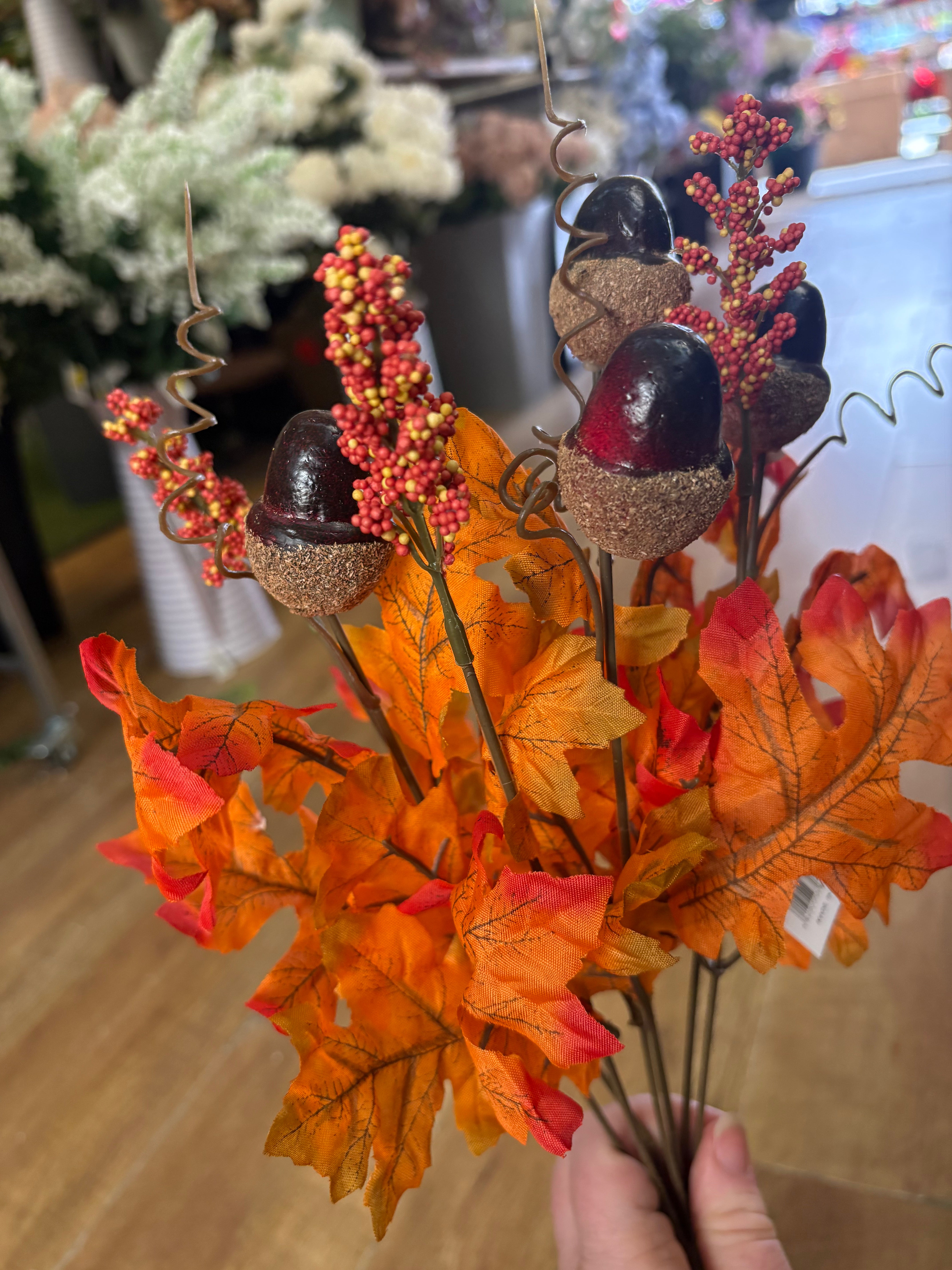 Autumnal orange acorn and foliage bunch