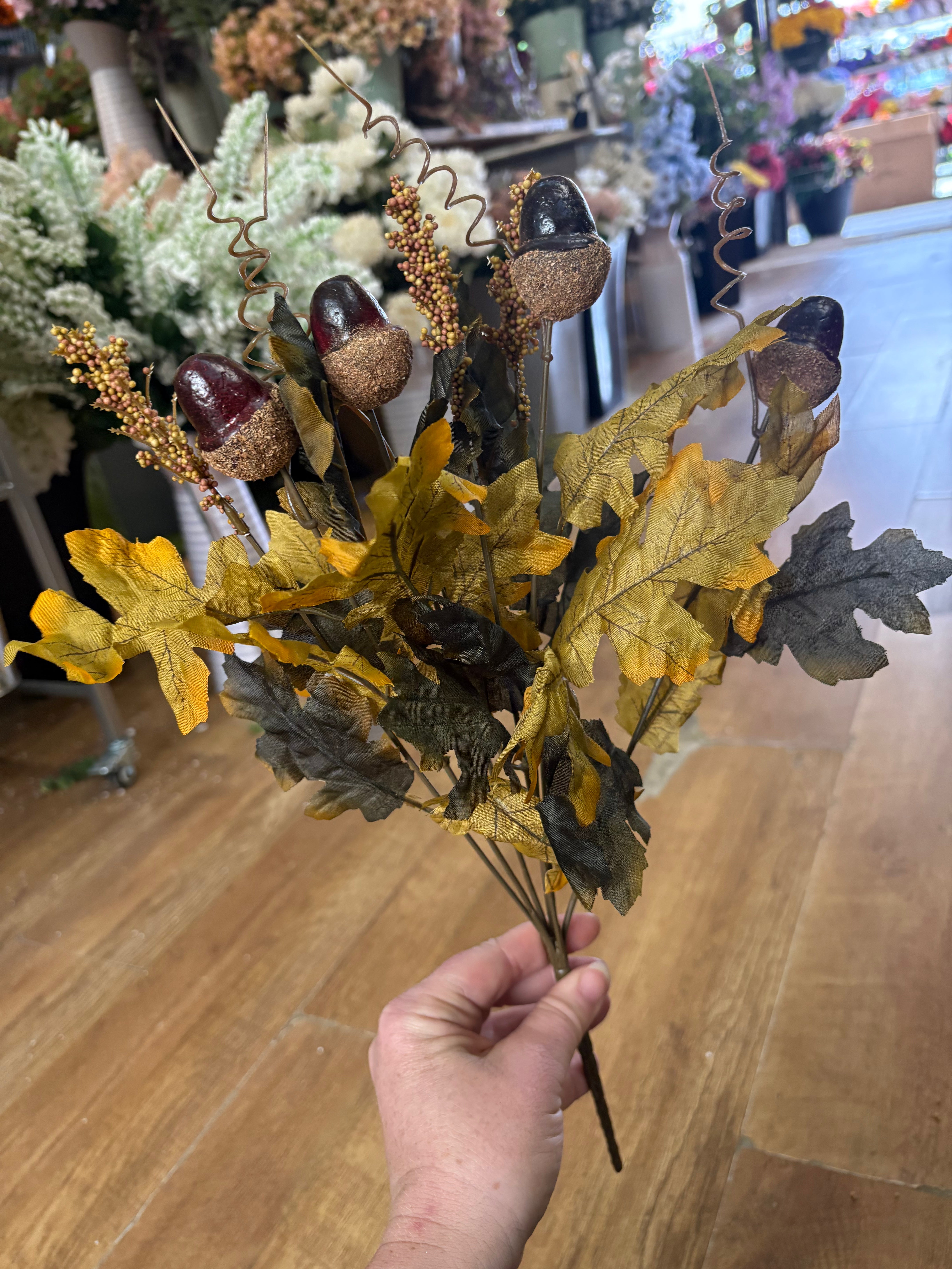 Dark green and autumnal green acorn and foliage bunch