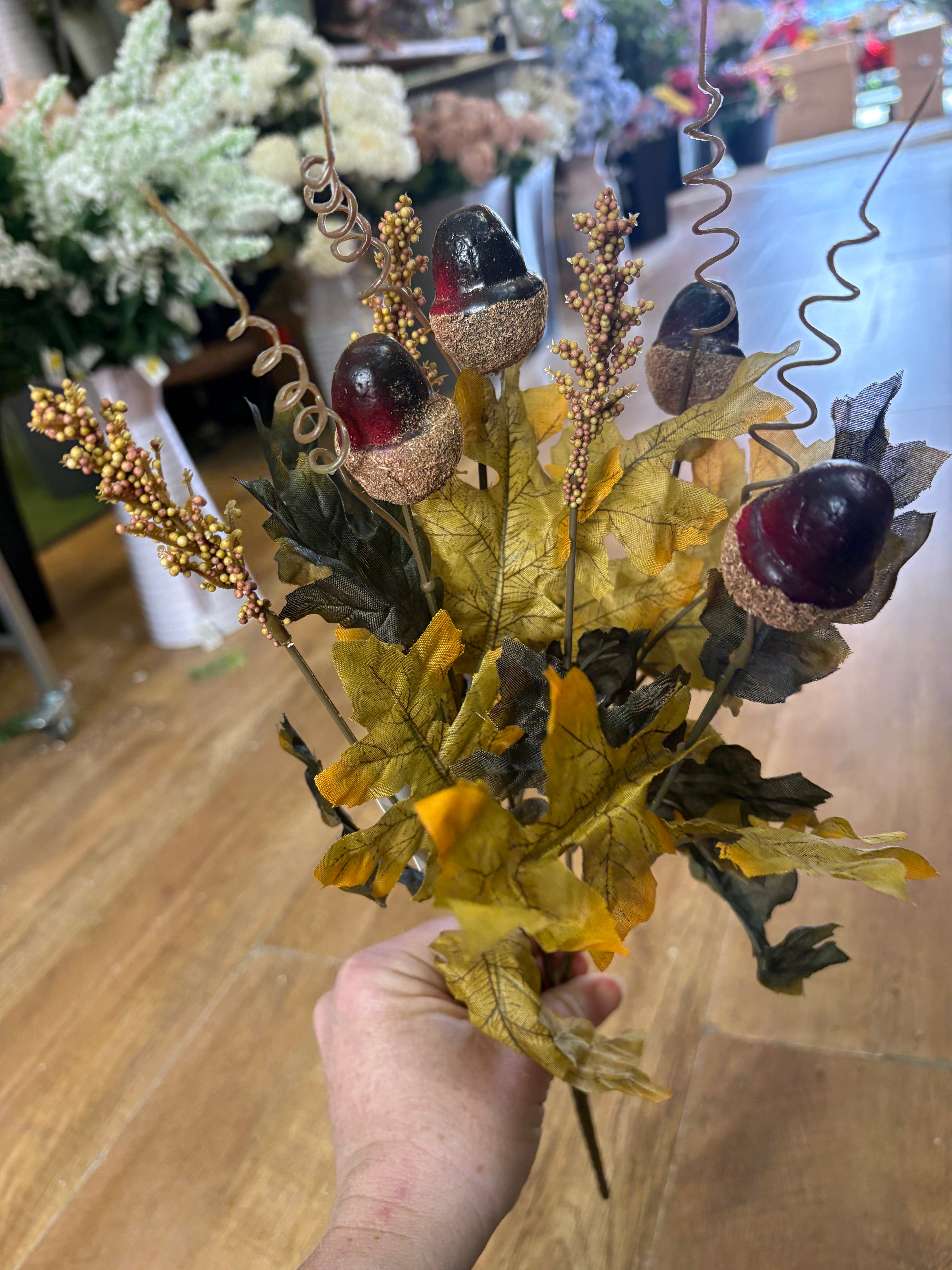 Dark green and autumnal green acorn and foliage bunch