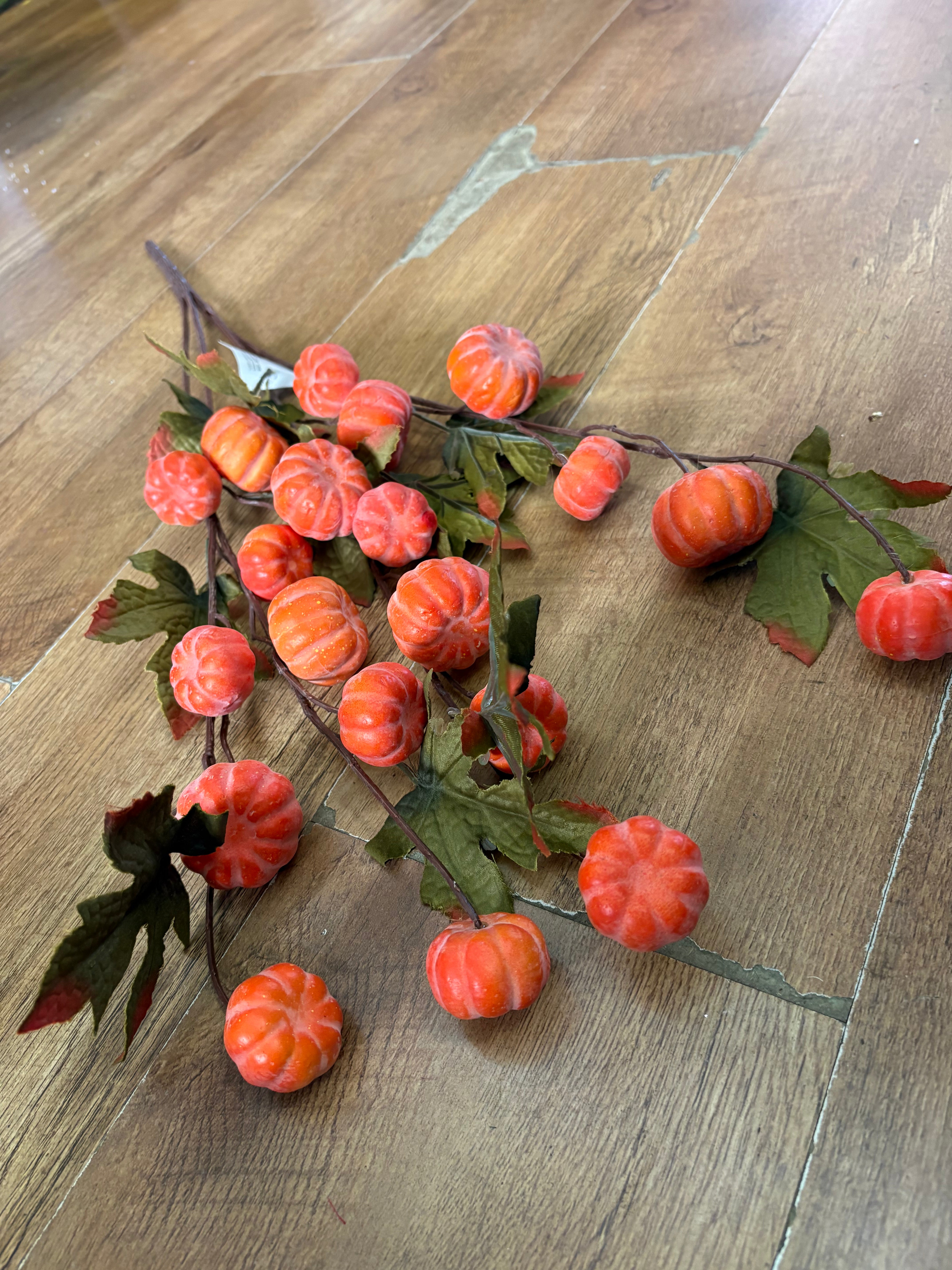 Large spray of pumpkins and maple leaves