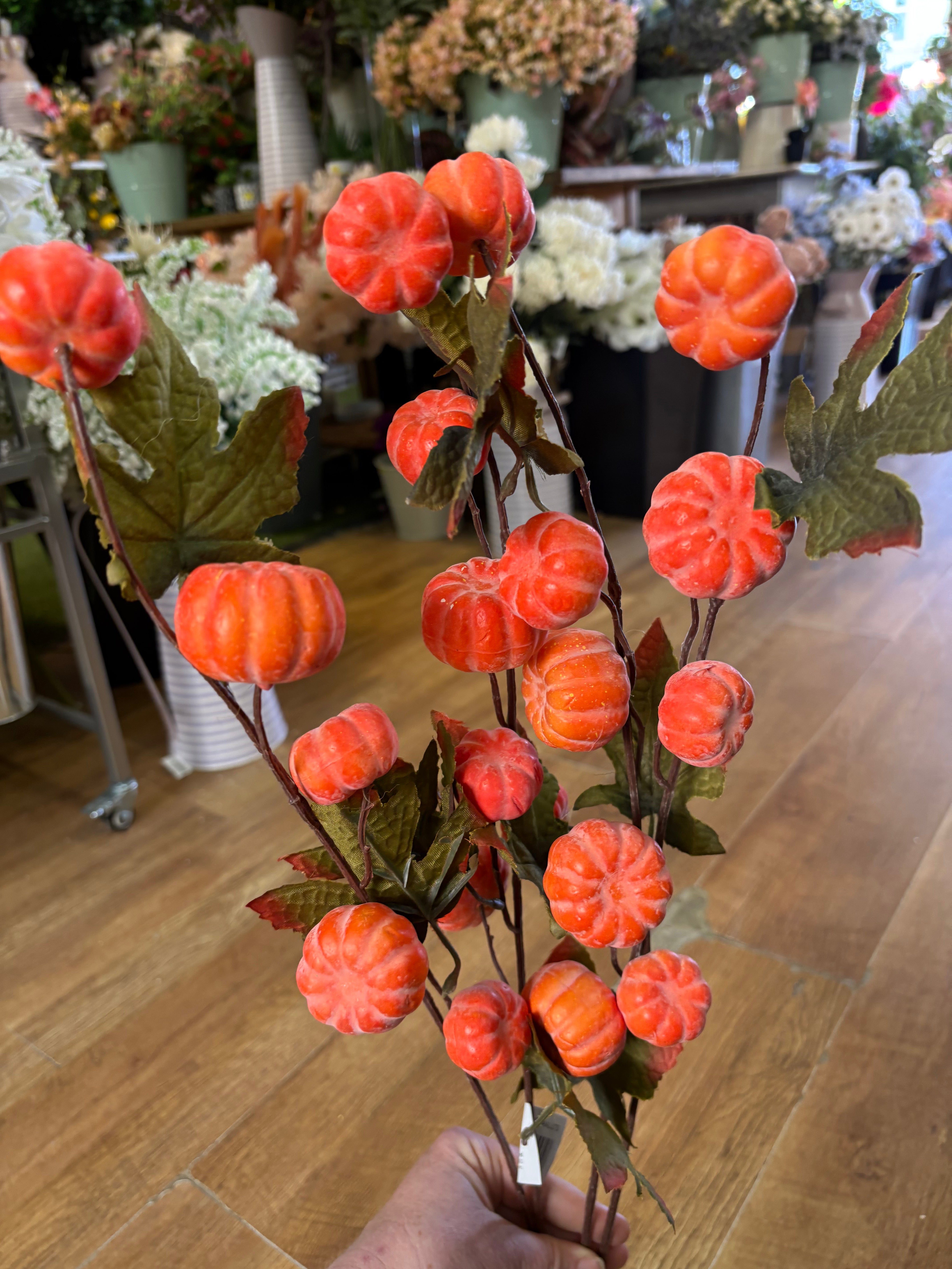 Large spray of pumpkins and maple leaves