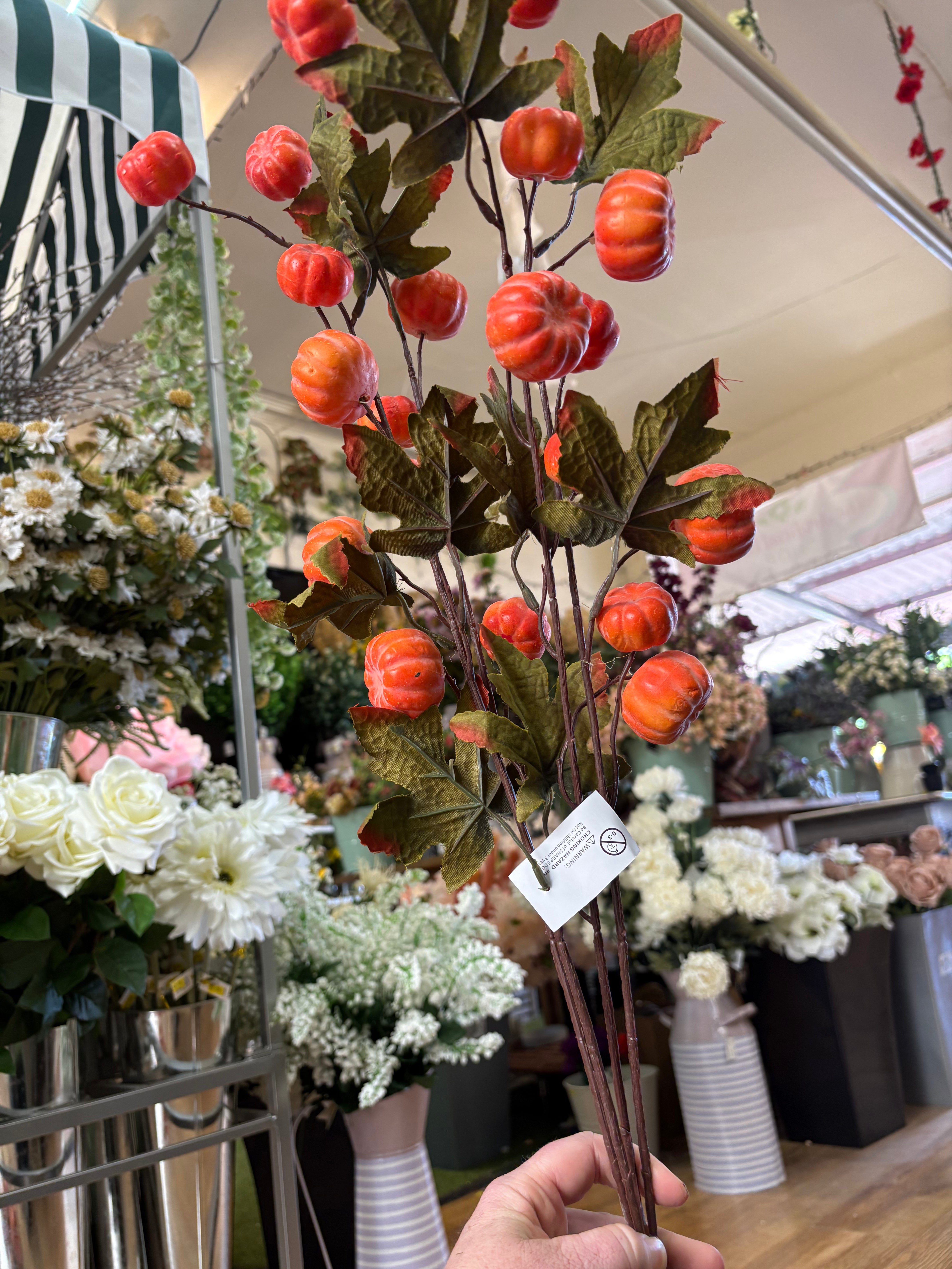 Large spray of pumpkins and maple leaves