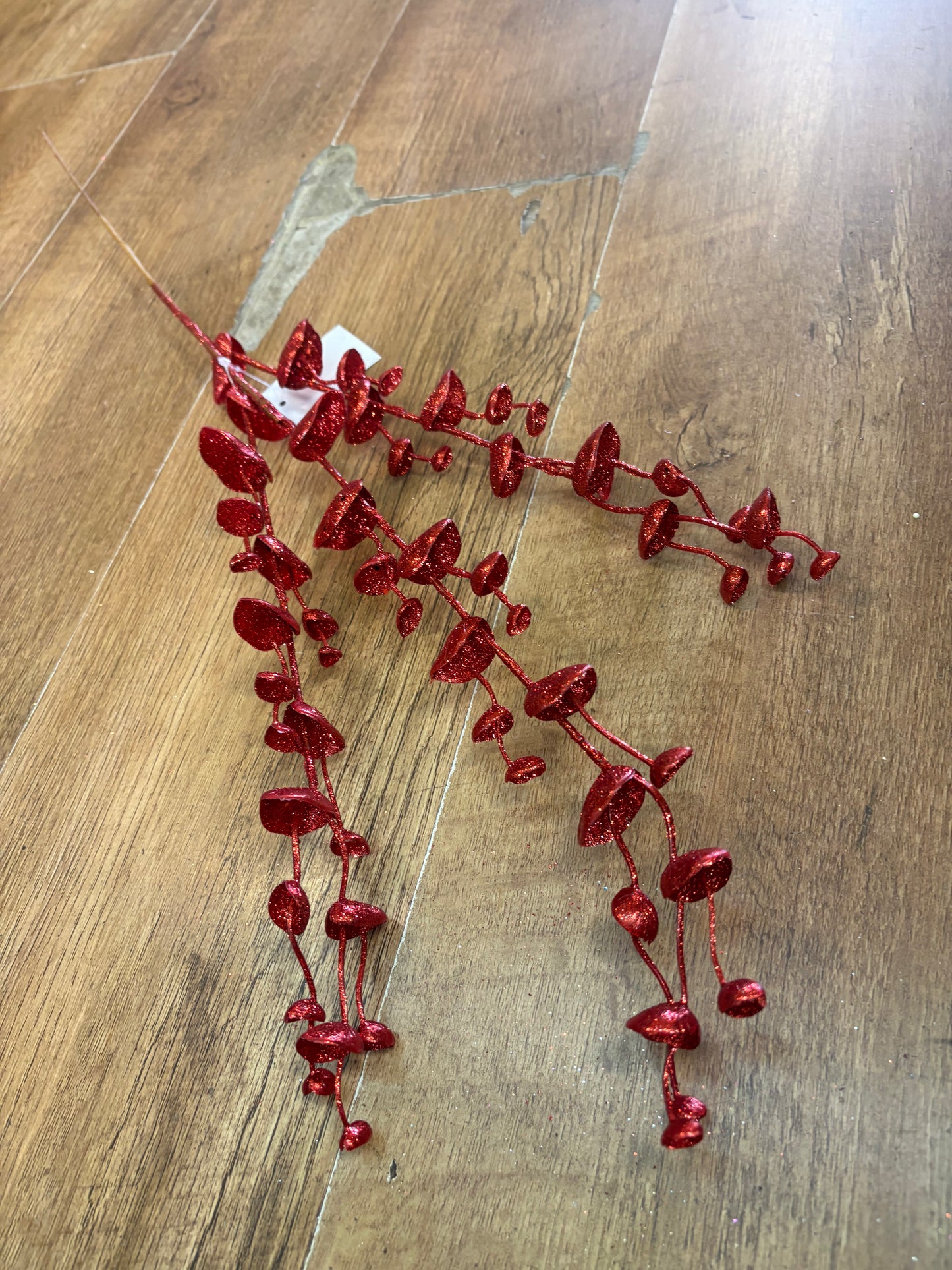 Long stem red glittered eucalyptus filler