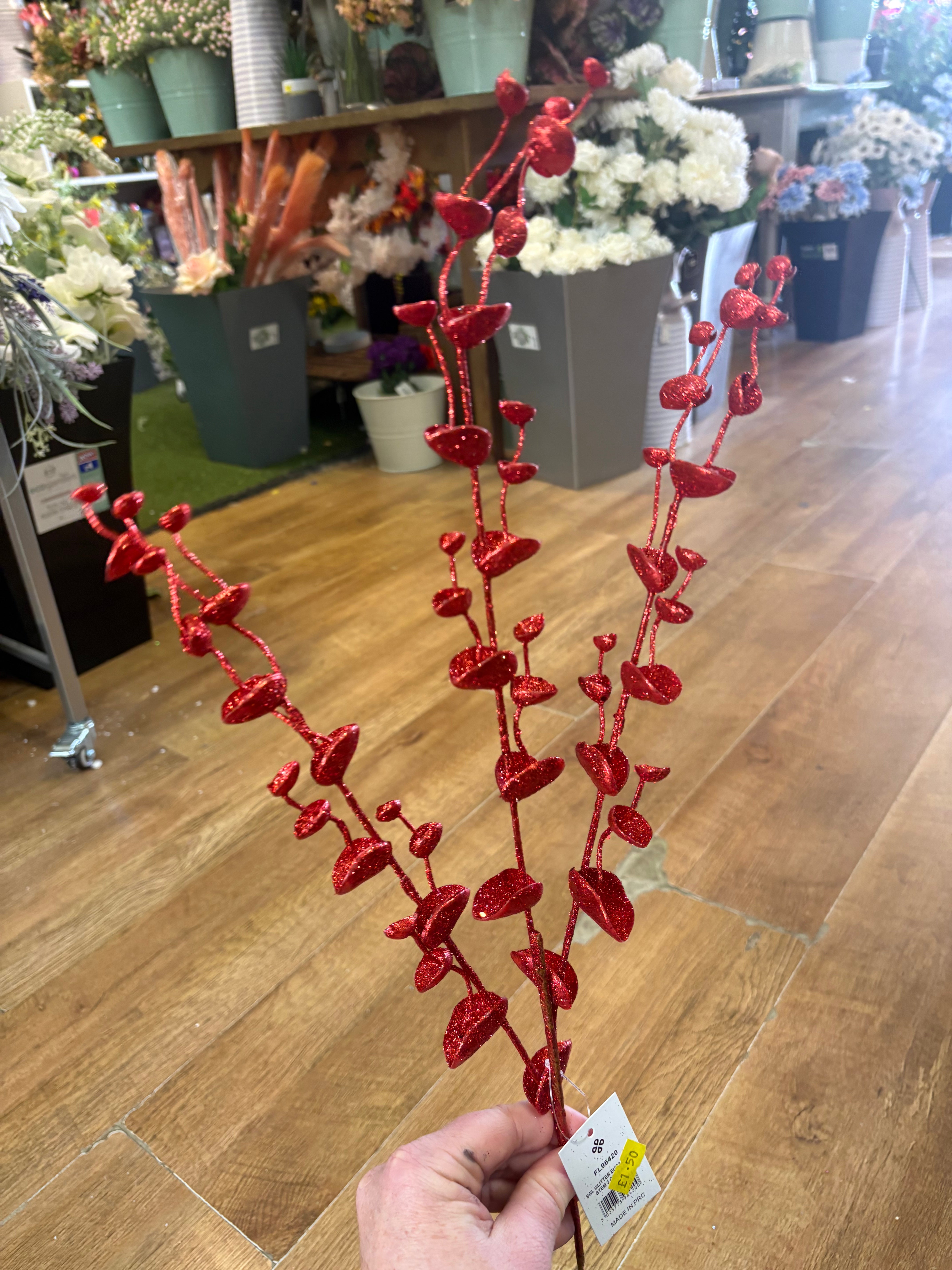 Long stem red glittered eucalyptus filler