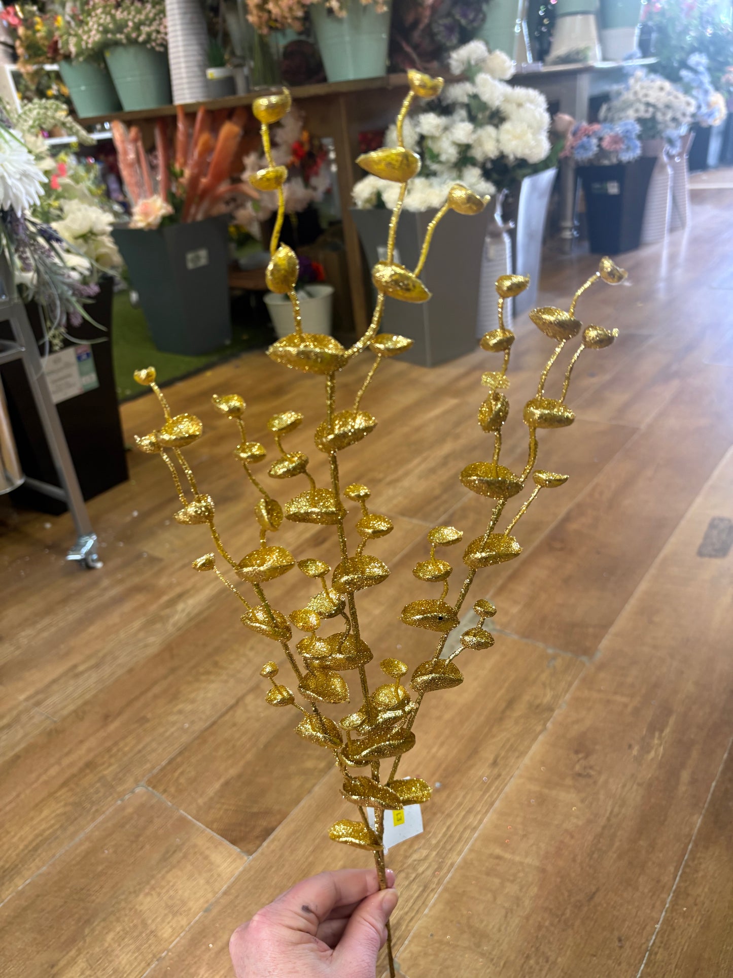 Long stem gold glittered eucalyptus filler