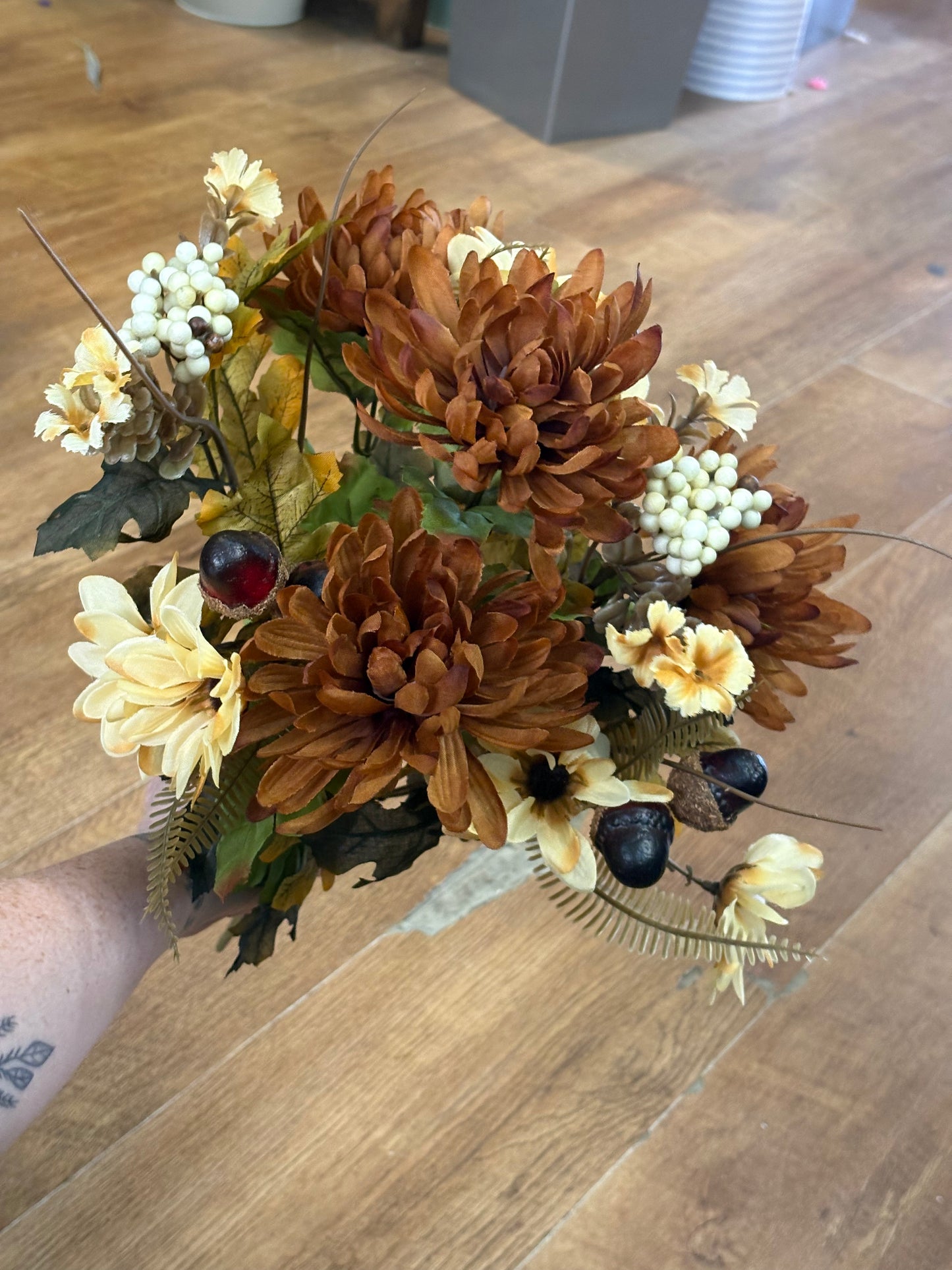 Brown and cream chrysanthemum, daisy and acorn bouquet