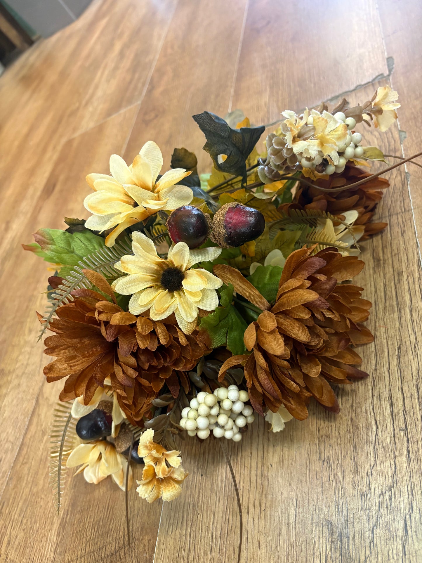 Brown and cream chrysanthemum, daisy and acorn bouquet