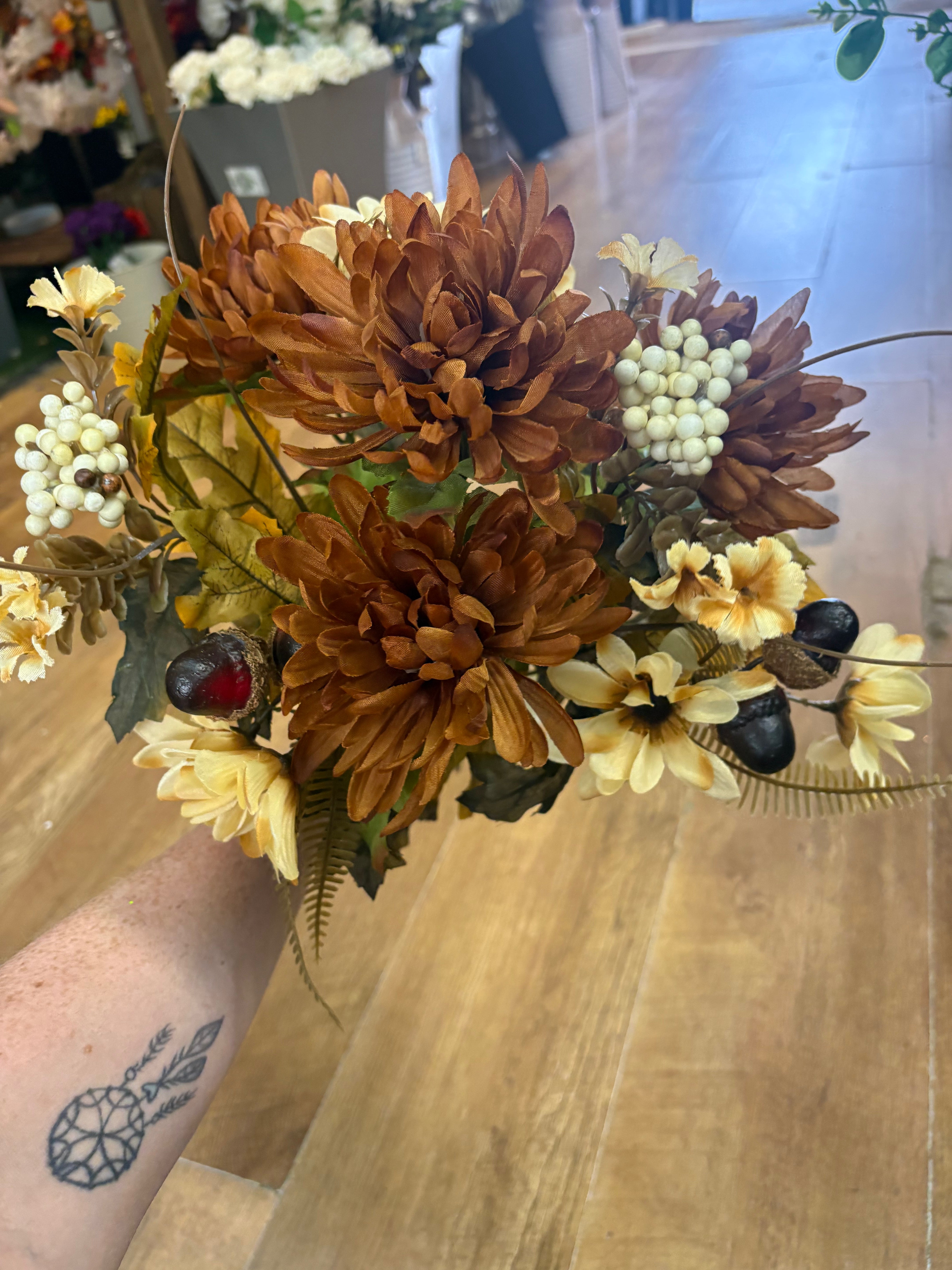 Brown and cream chrysanthemum, daisy and acorn bouquet
