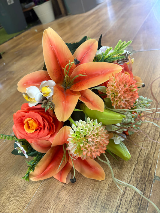 Orange Premium lily, rose and mixed florals/foliage bouquet with 1m of matching satin ribbon
