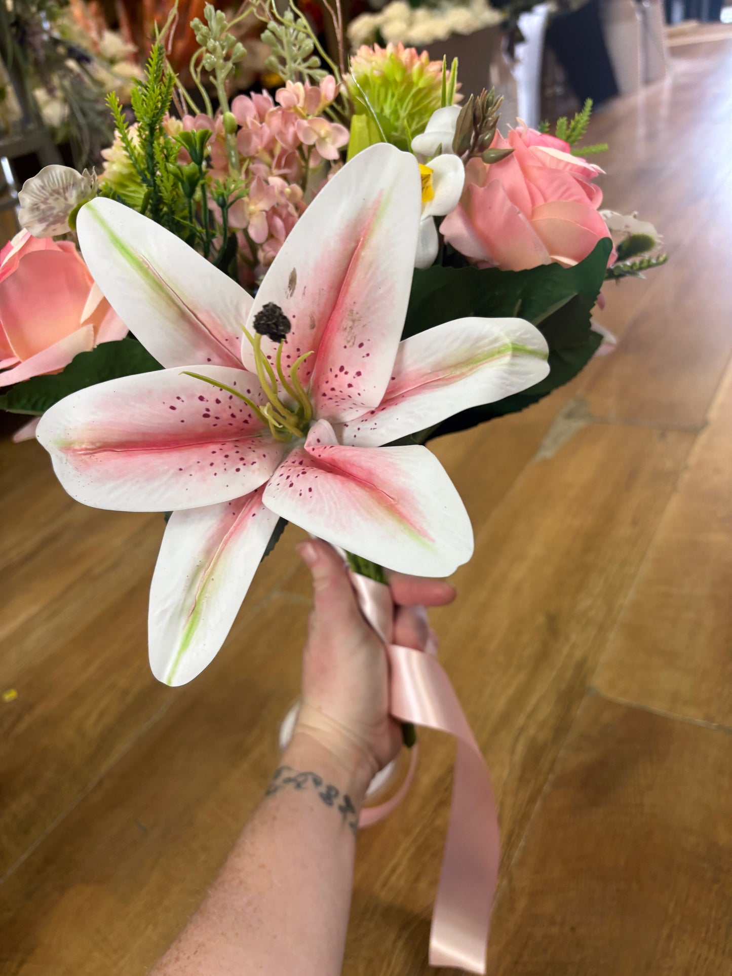 Pink Premium lily, rose and mixed florals/foliage bouquet with 1m of matching satin ribbon