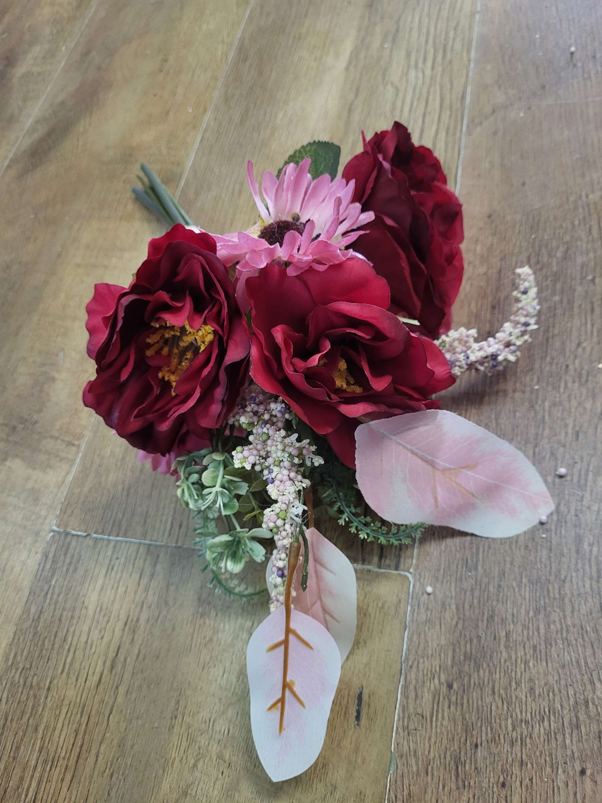 Hand tied red and pink mixed floral/foliage bundle image 4