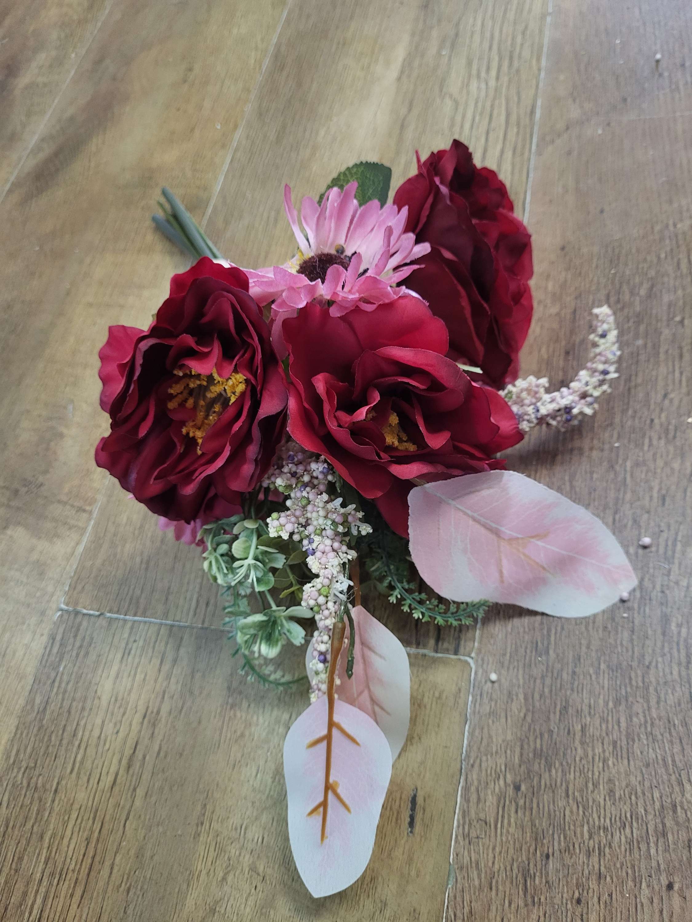Hand tied red and pink mixed floral/foliage bundle image 4
