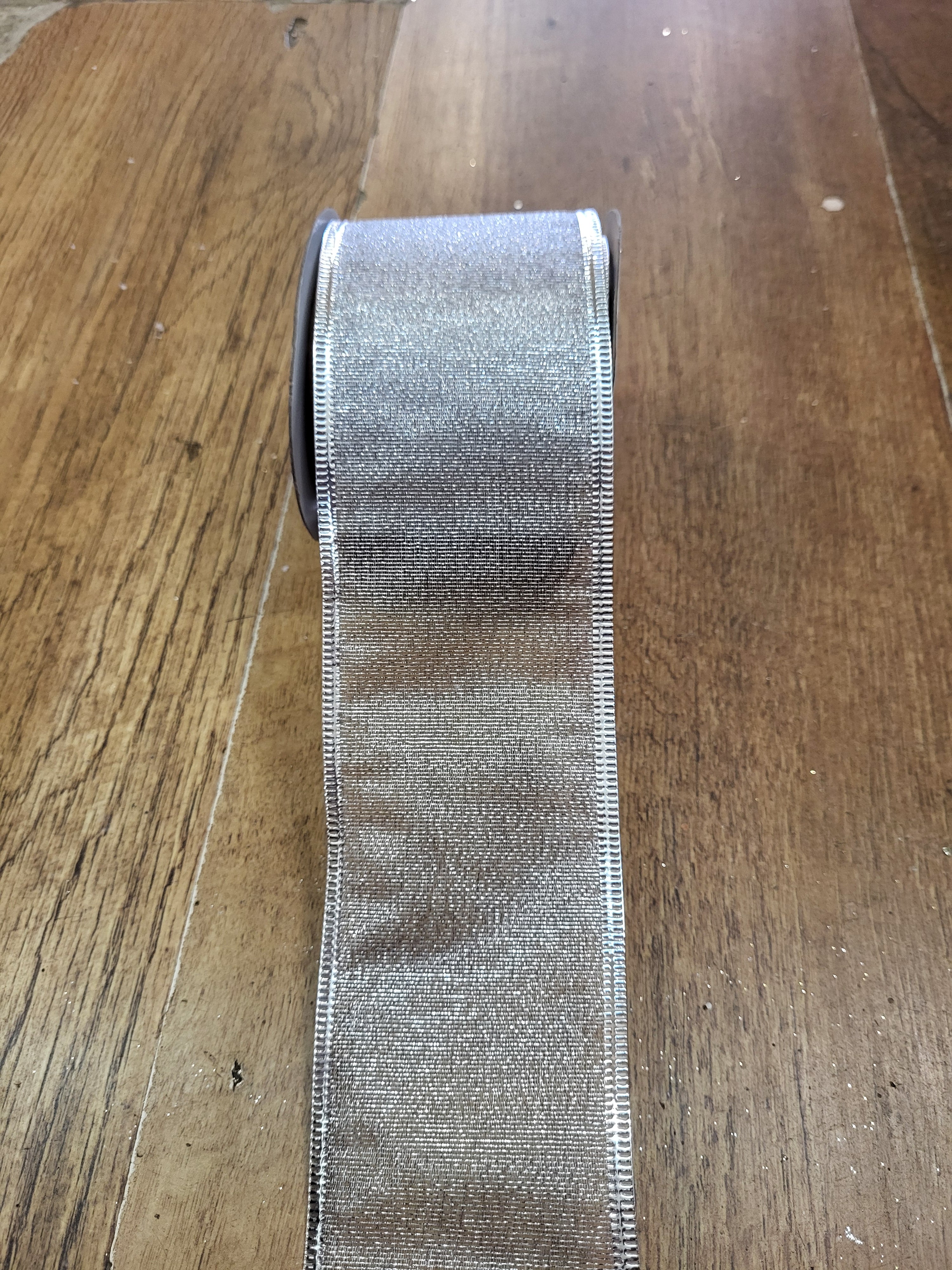 2.7m approx. roll of silver shimmery wired ribbon image 0