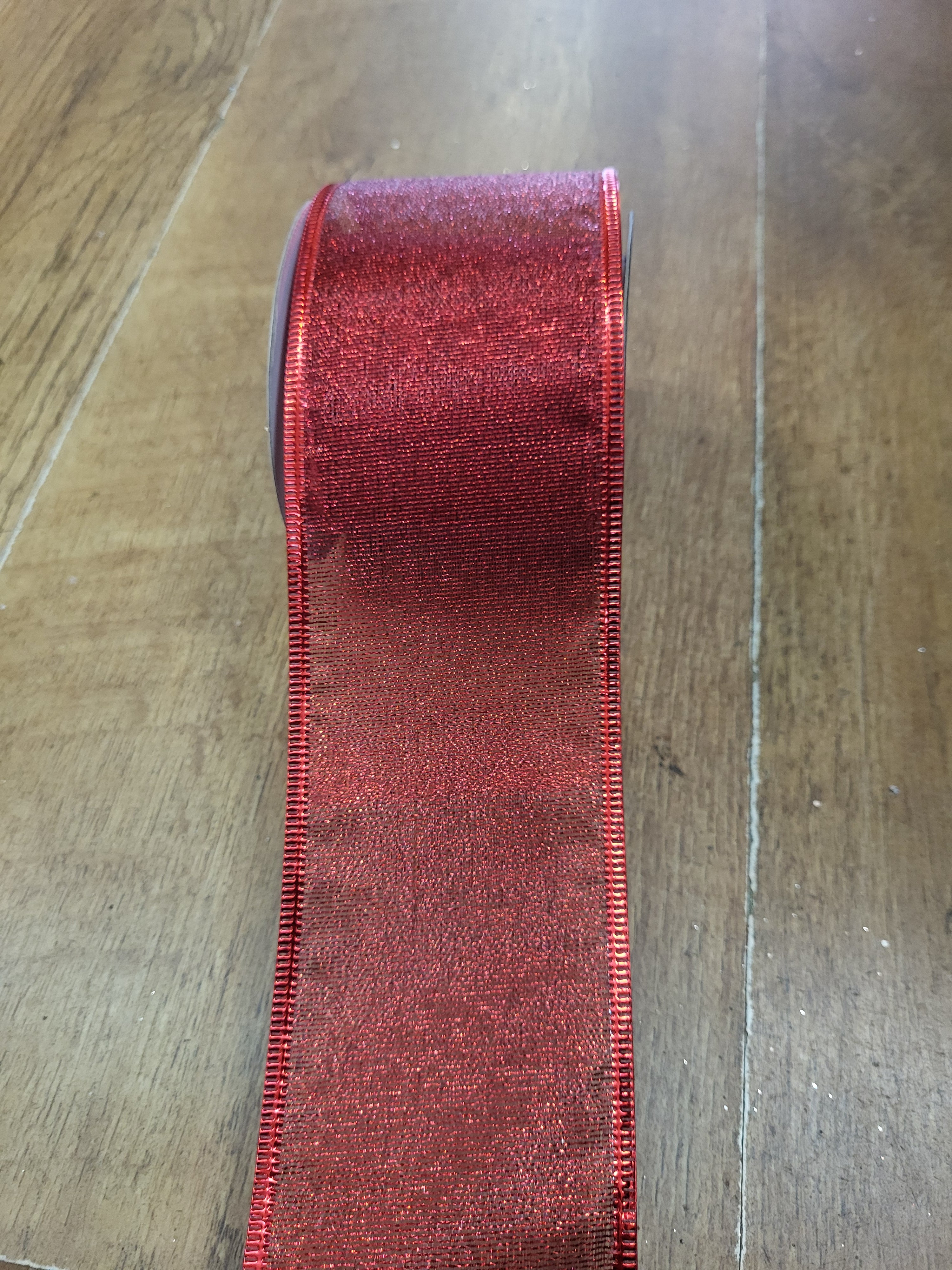 2.7m approx. roll of red shimmery wired ribbon image 0