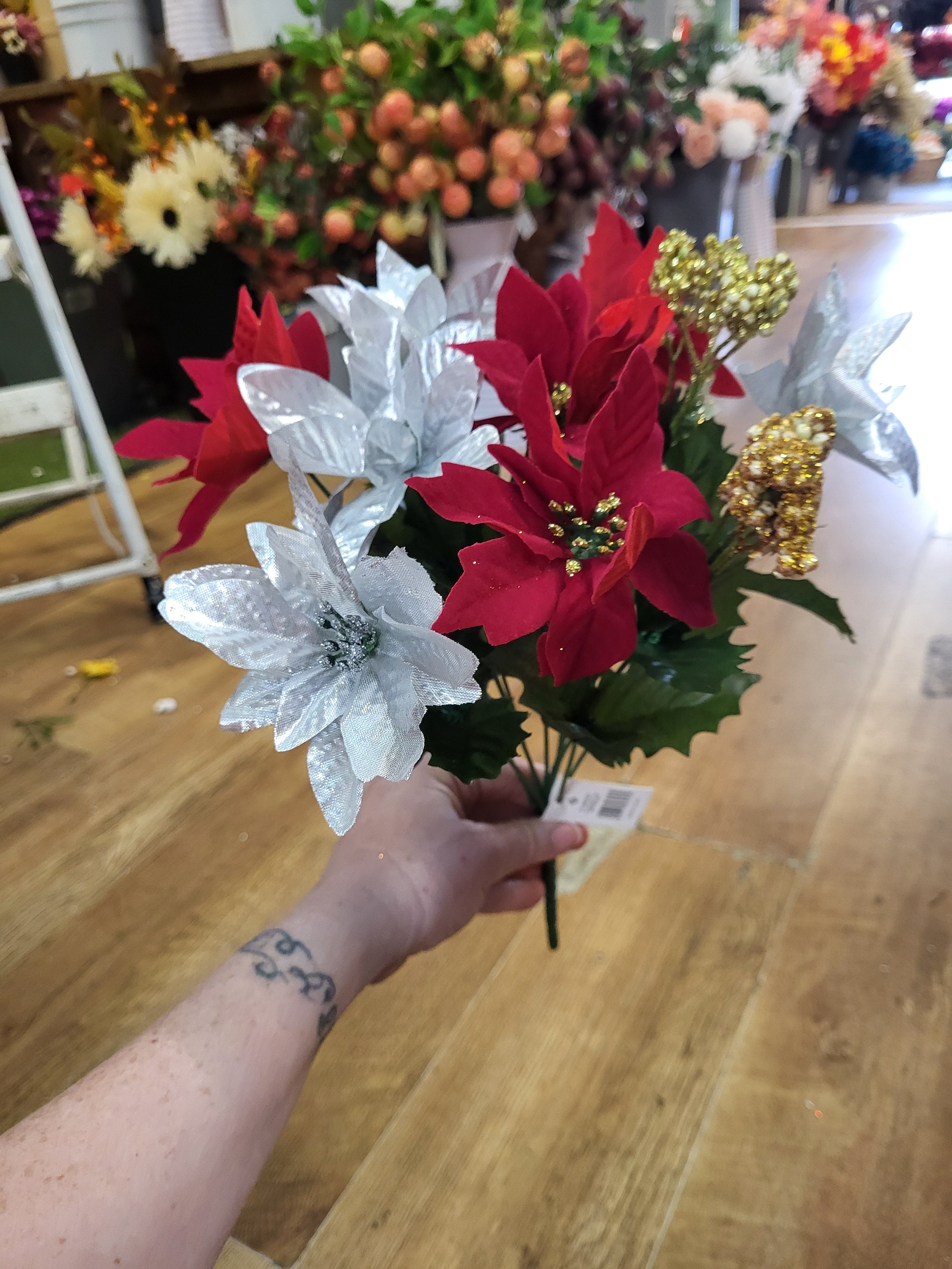 Red and silver poinsettia bunch with gold berries  image 2