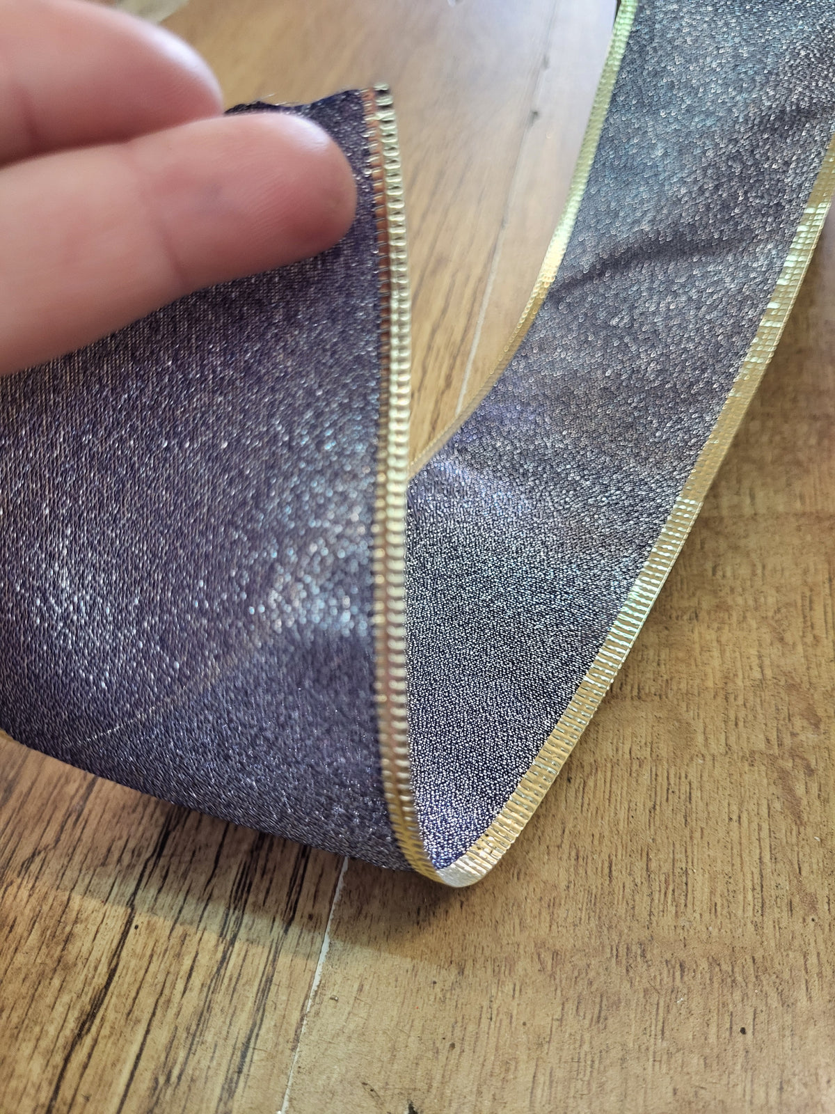 2.7m approx. roll of navy/champagne gold shimmery wired ribbon image 2