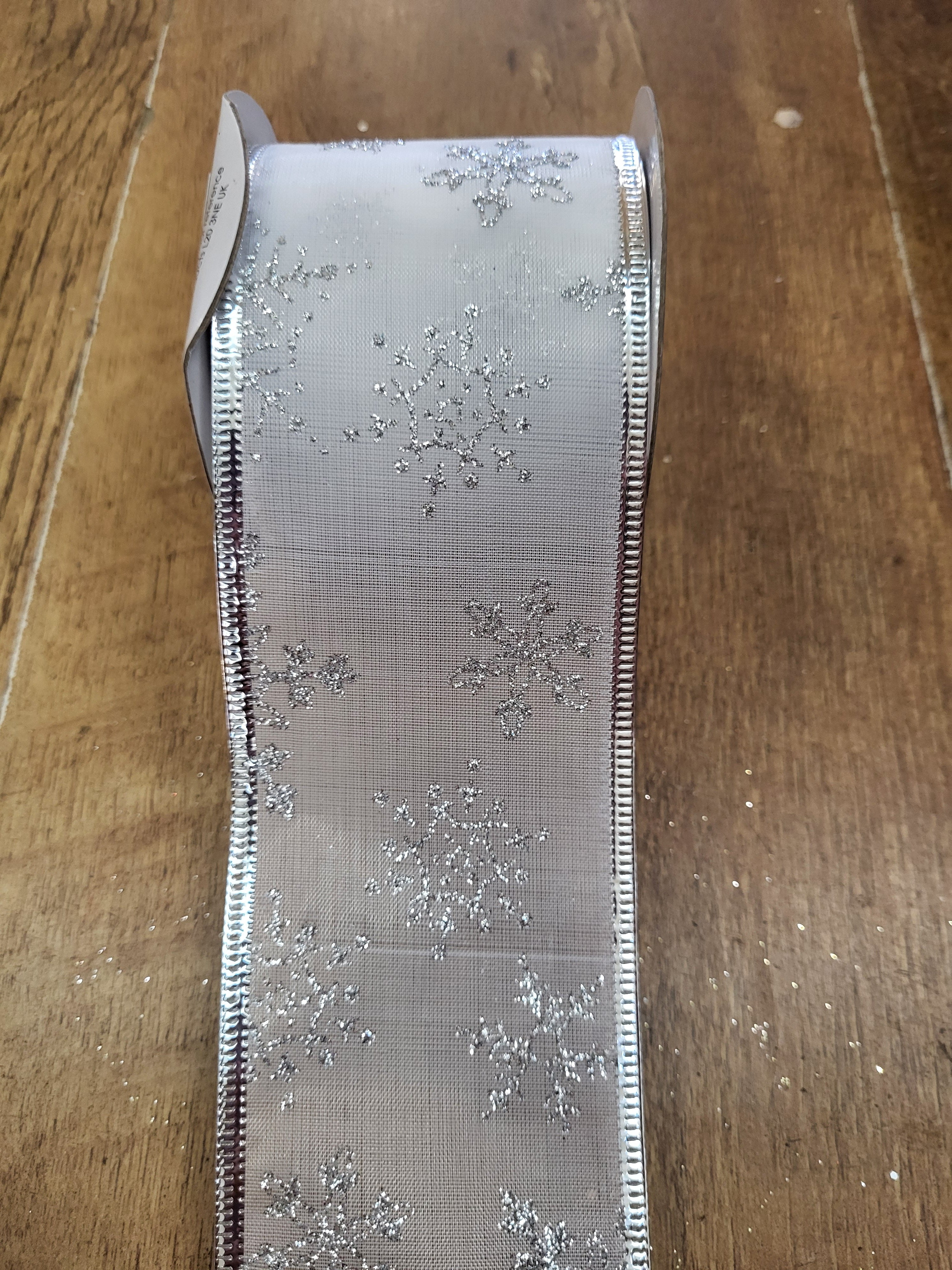 2.7m approx. roll of white/silver snowflake wired ribbon image 1
