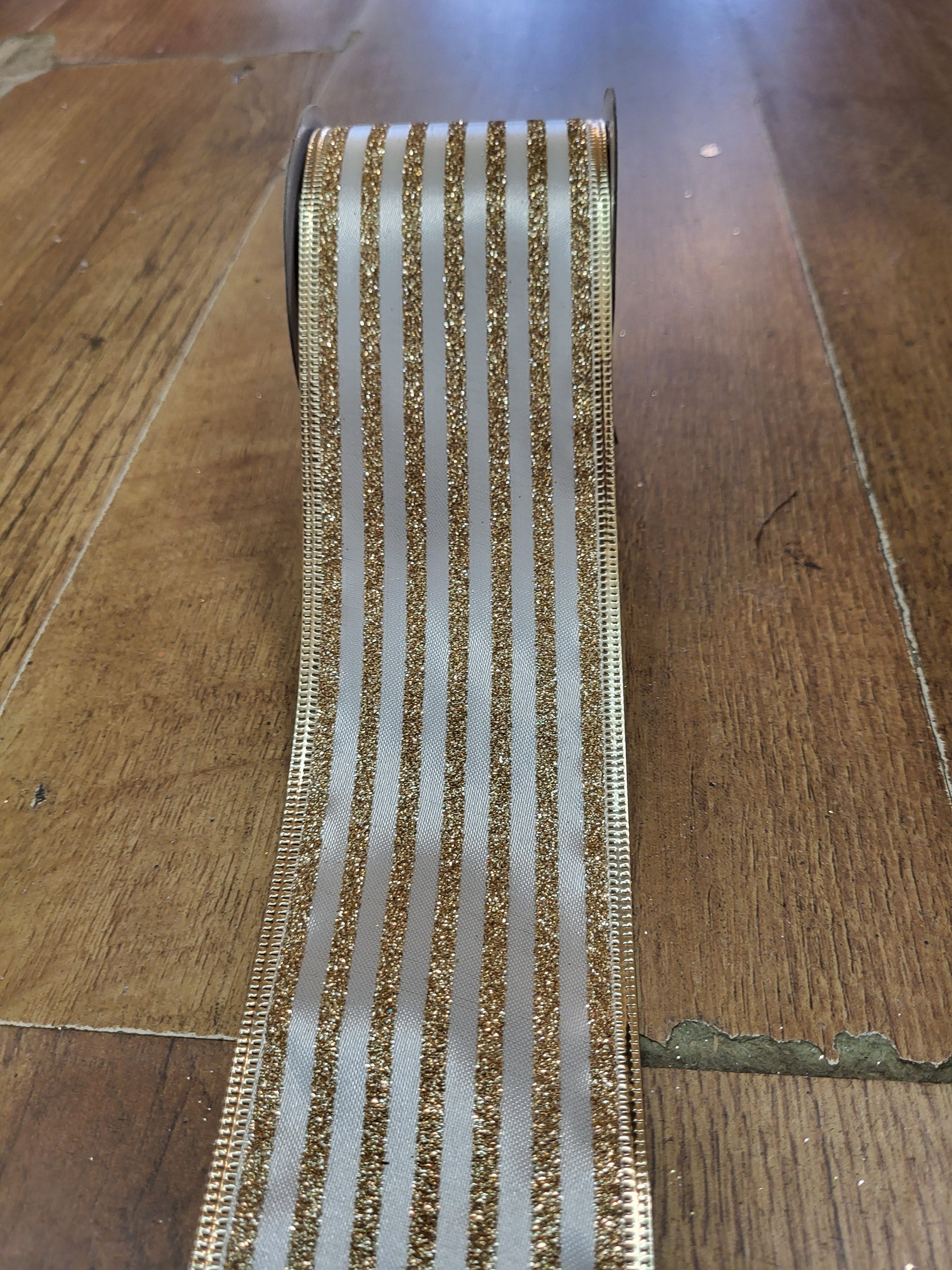 2.7m approx. roll of cream/gold glitter striped wired ribbon image 0