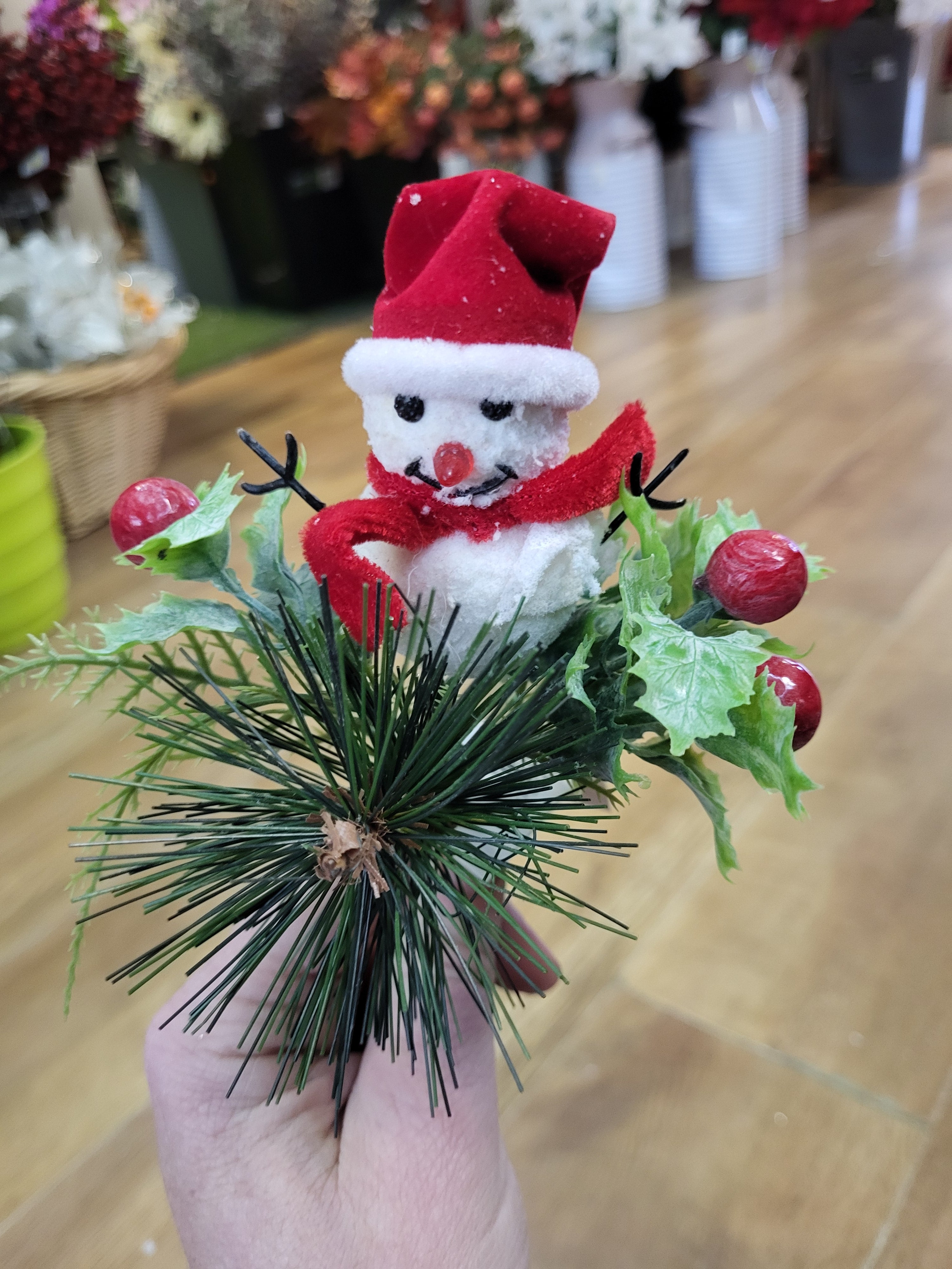 Snowman in a santa hat pick image 4