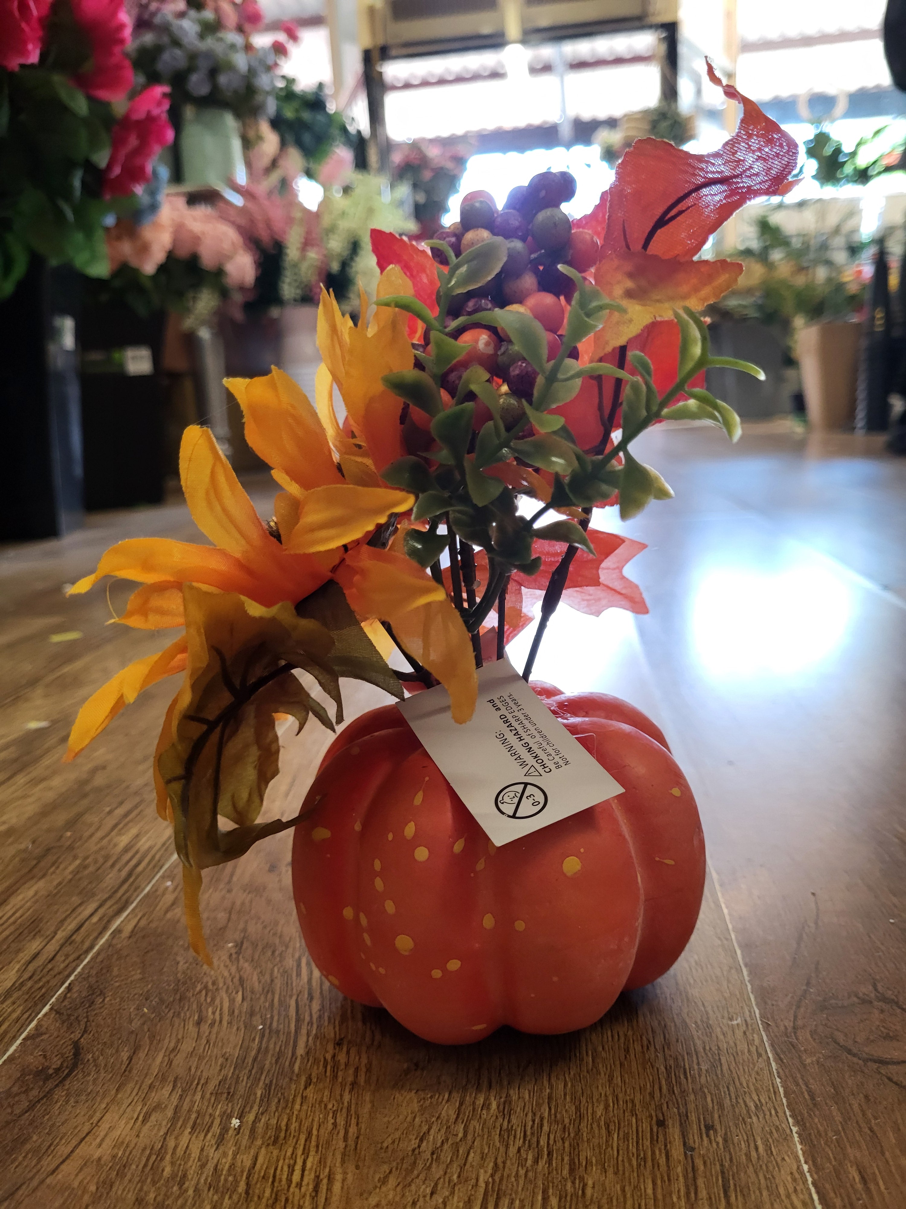 Sunflower/berry/foliage in pumpkin display  image 4