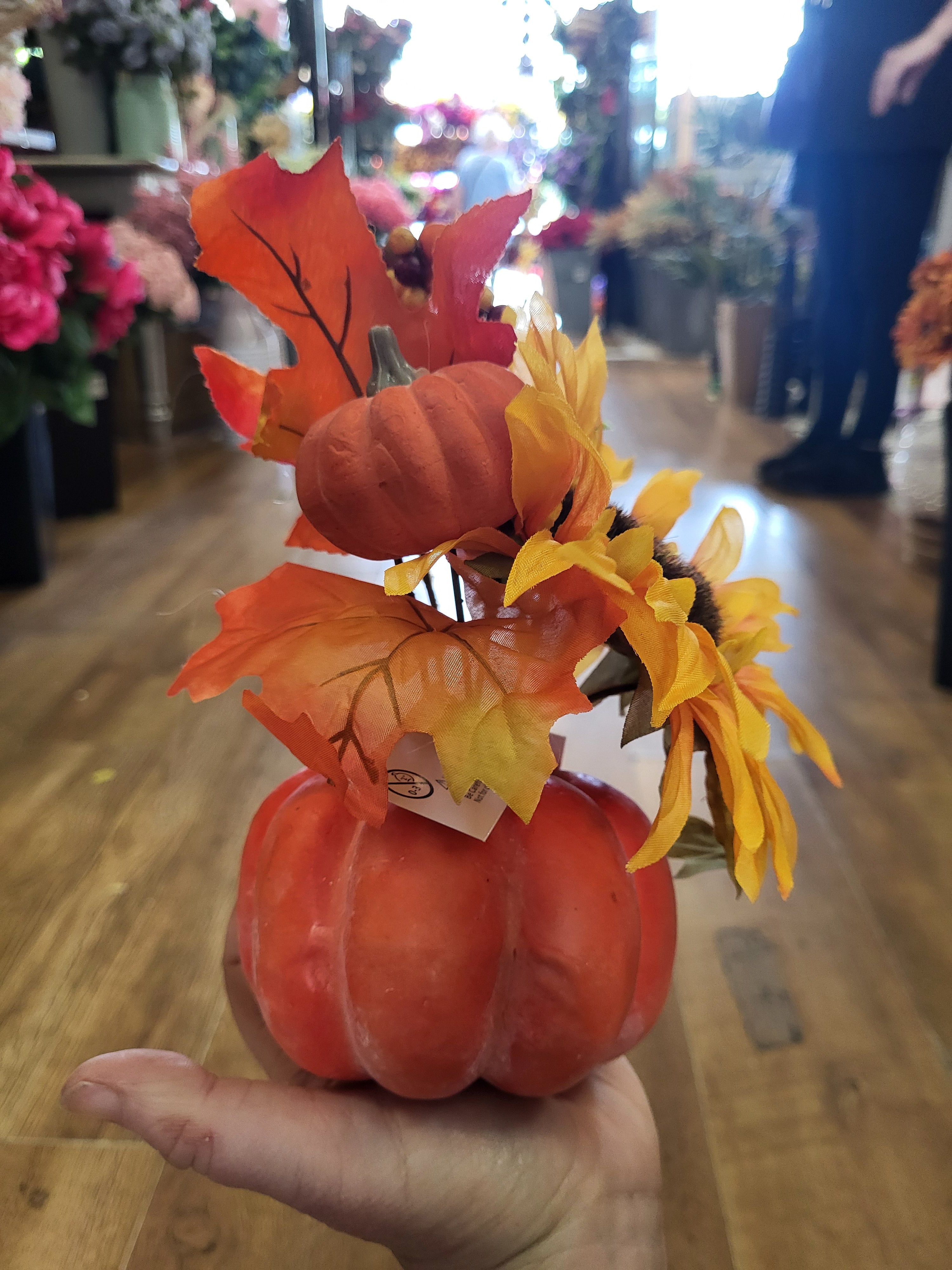 Sunflower/berry/foliage in pumpkin display  image 6