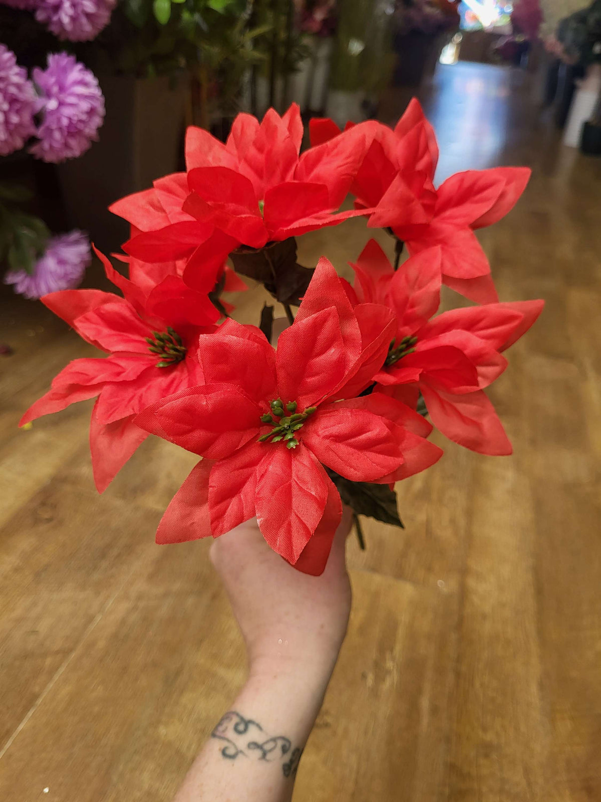 Red poinsettia bunch image 3