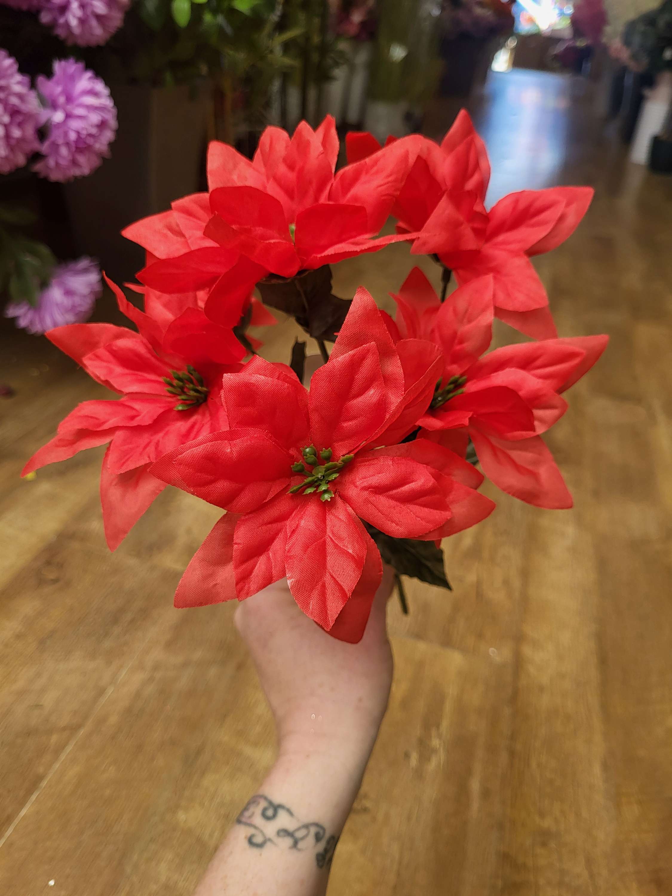 Red poinsettia bunch image 3