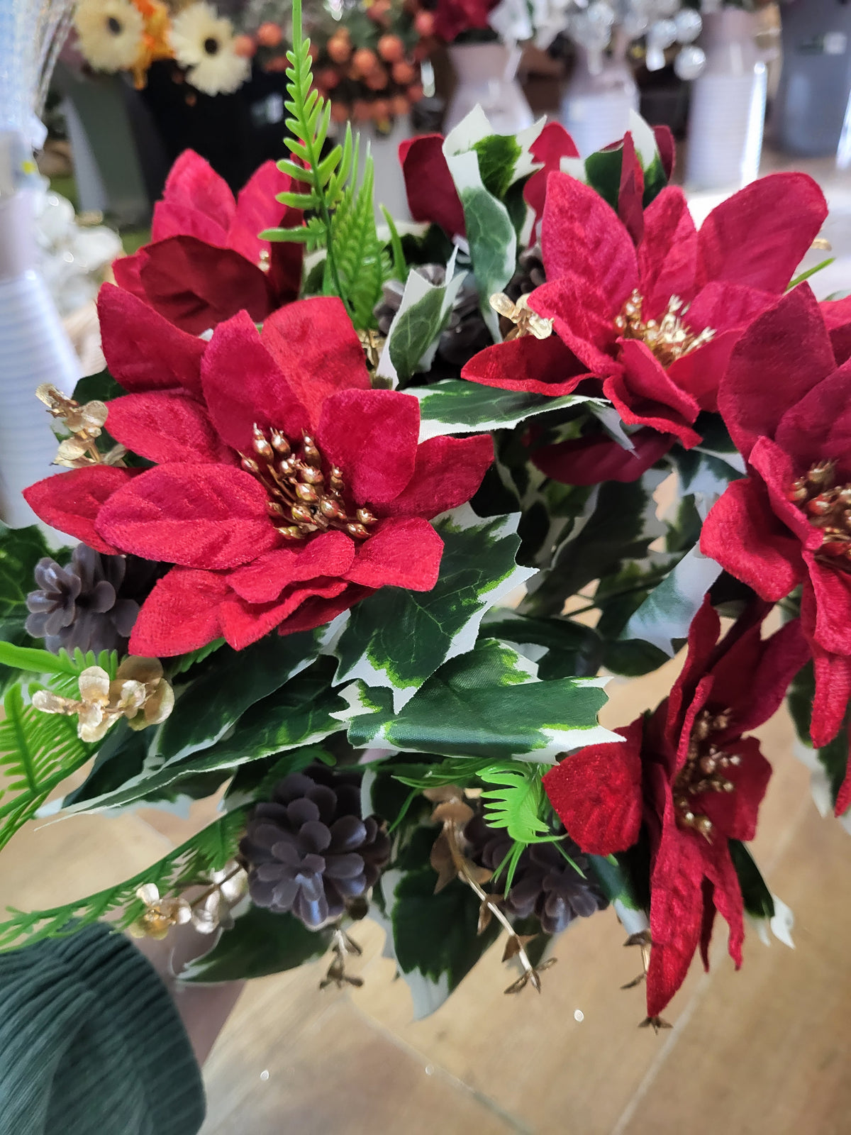 Large red velvet poinsettia and cone bouquet  image 1