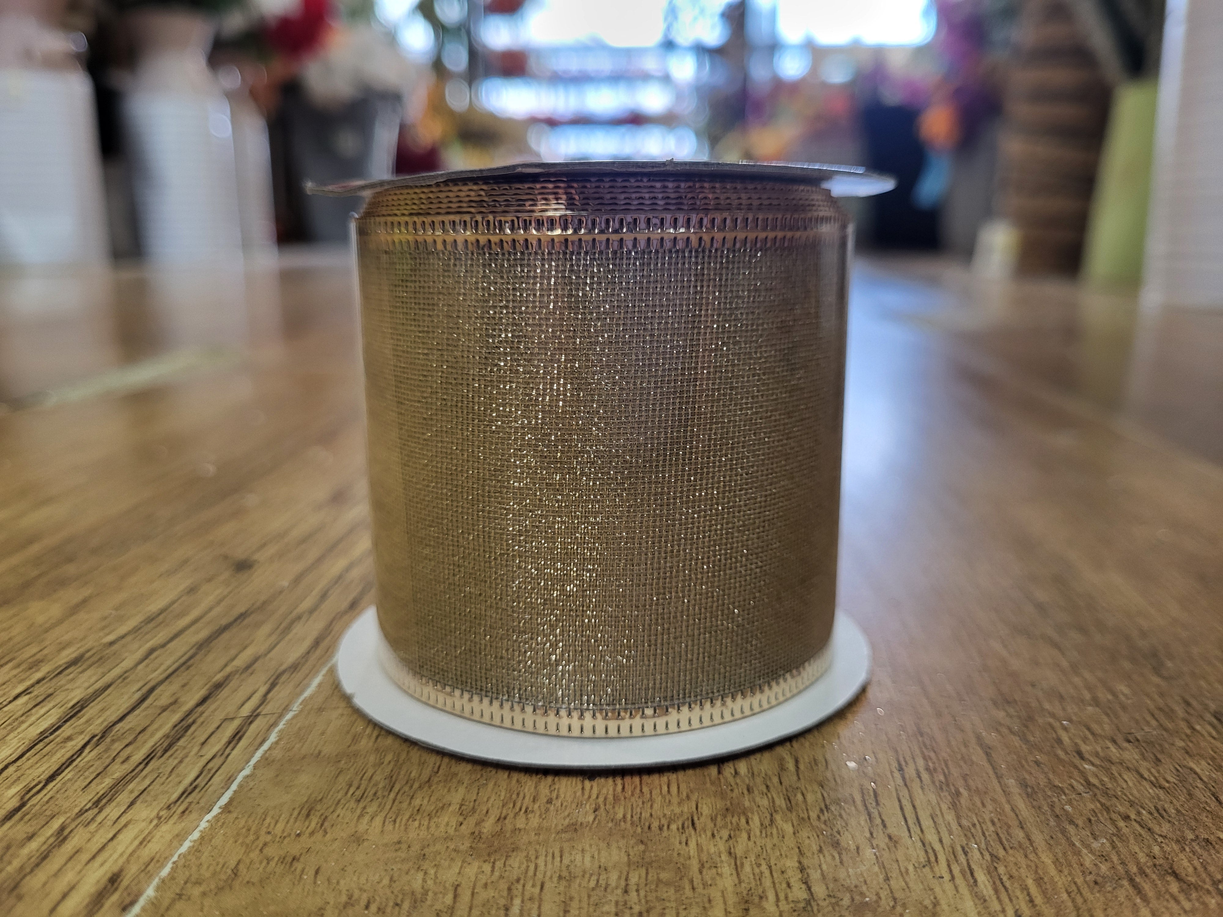 2.7m approx. roll of champagne gold shimmery wired ribbon image 1