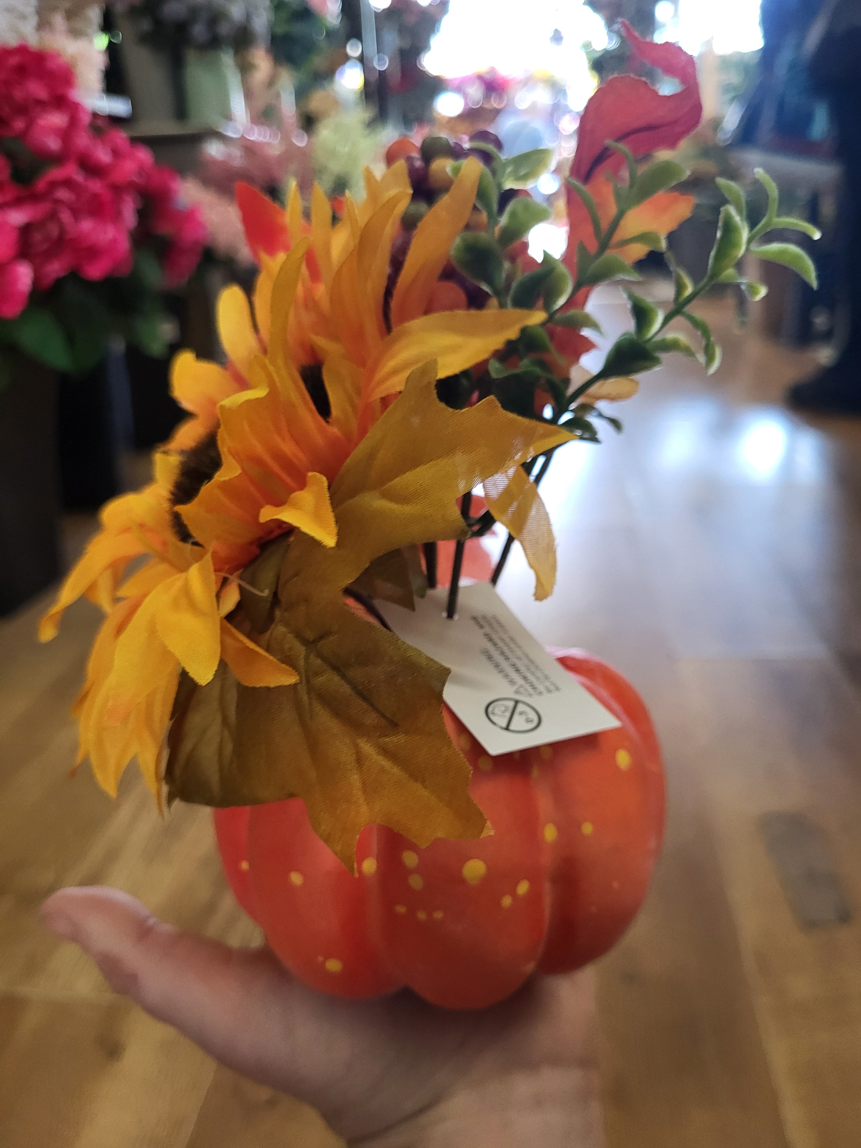 Sunflower/berry/foliage in pumpkin display  image 7