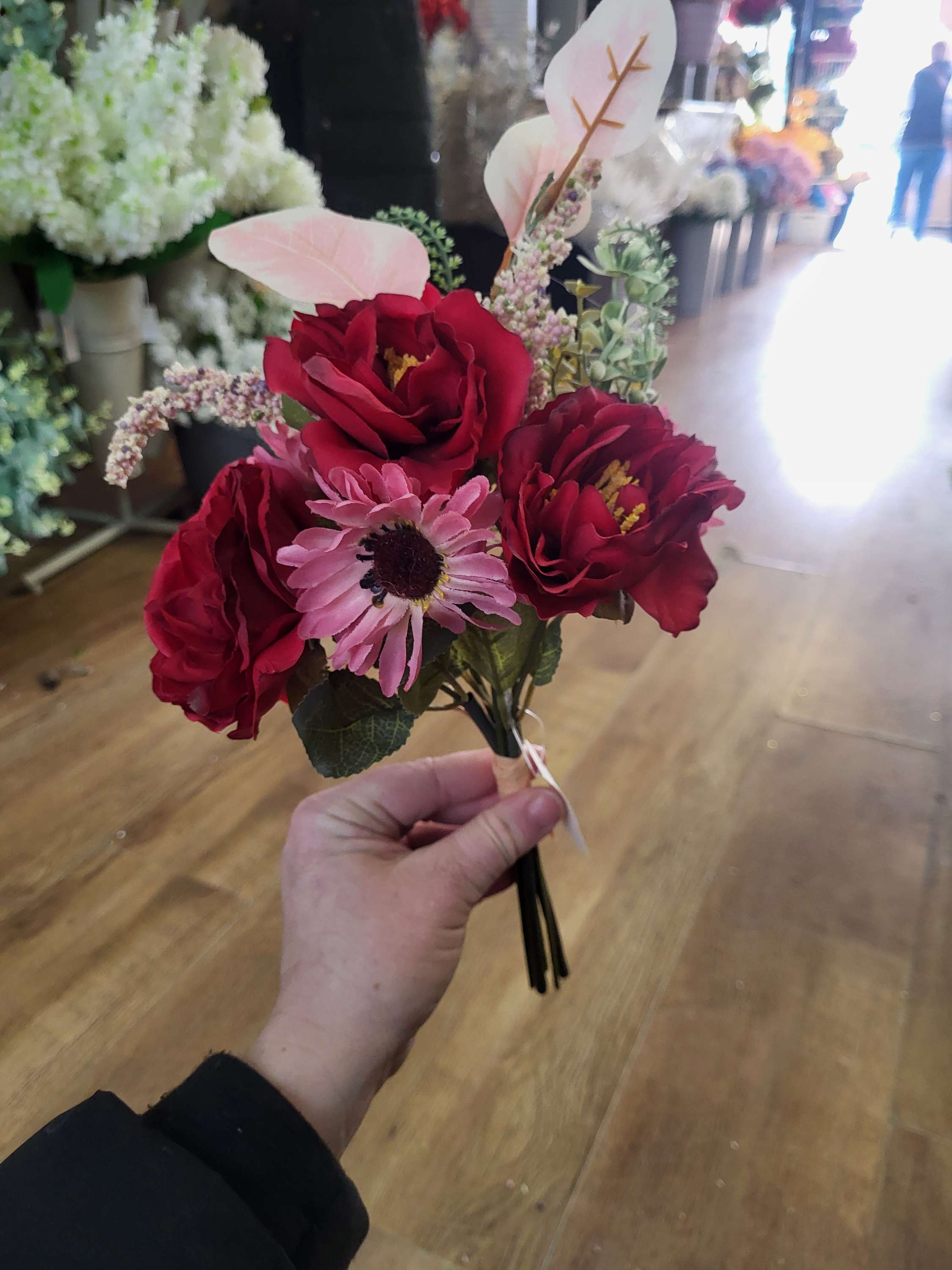 Hand tied red and pink mixed floral/foliage bundle image 1