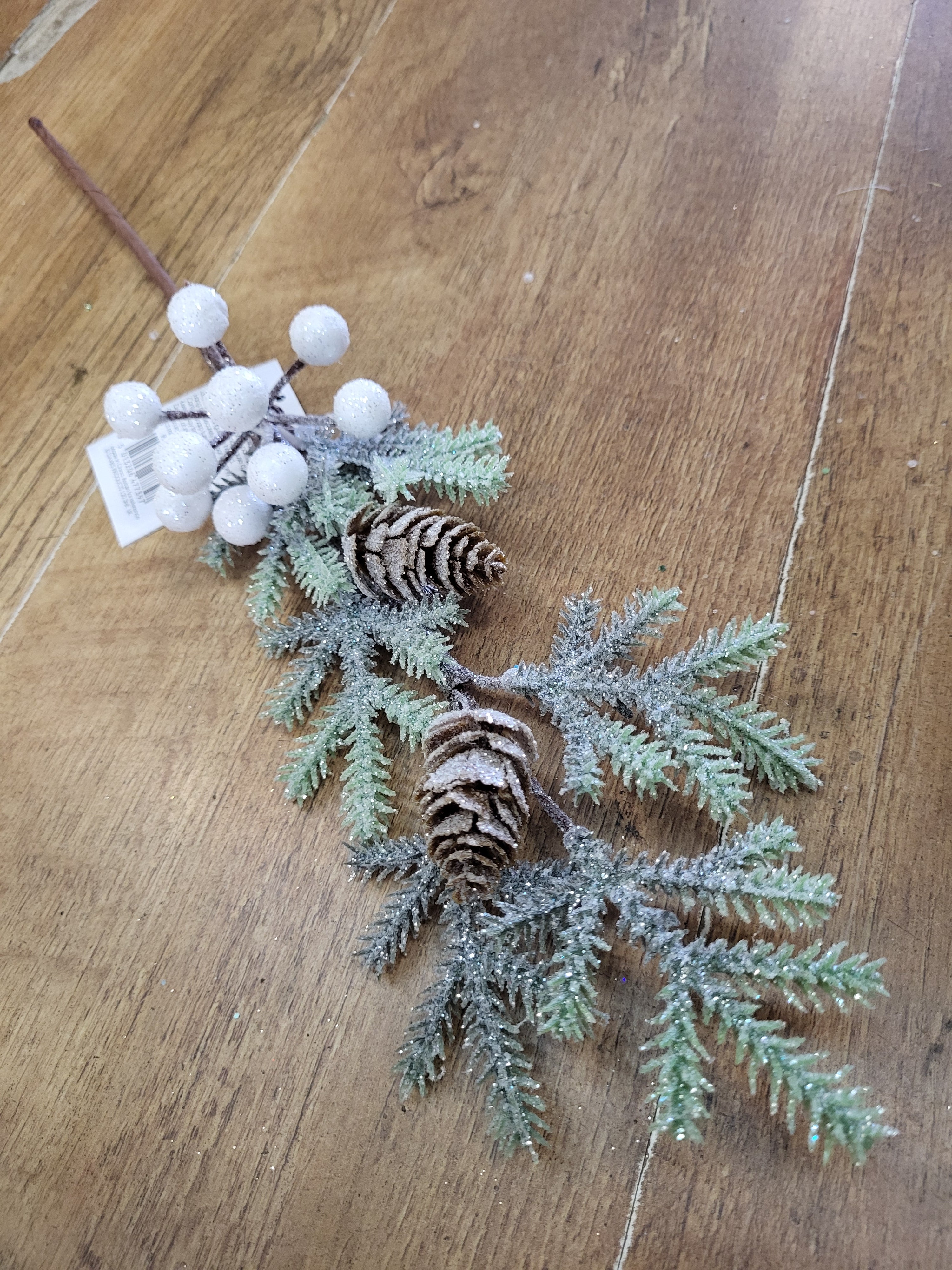Frosted foliage stem with cones and white berries  image 0