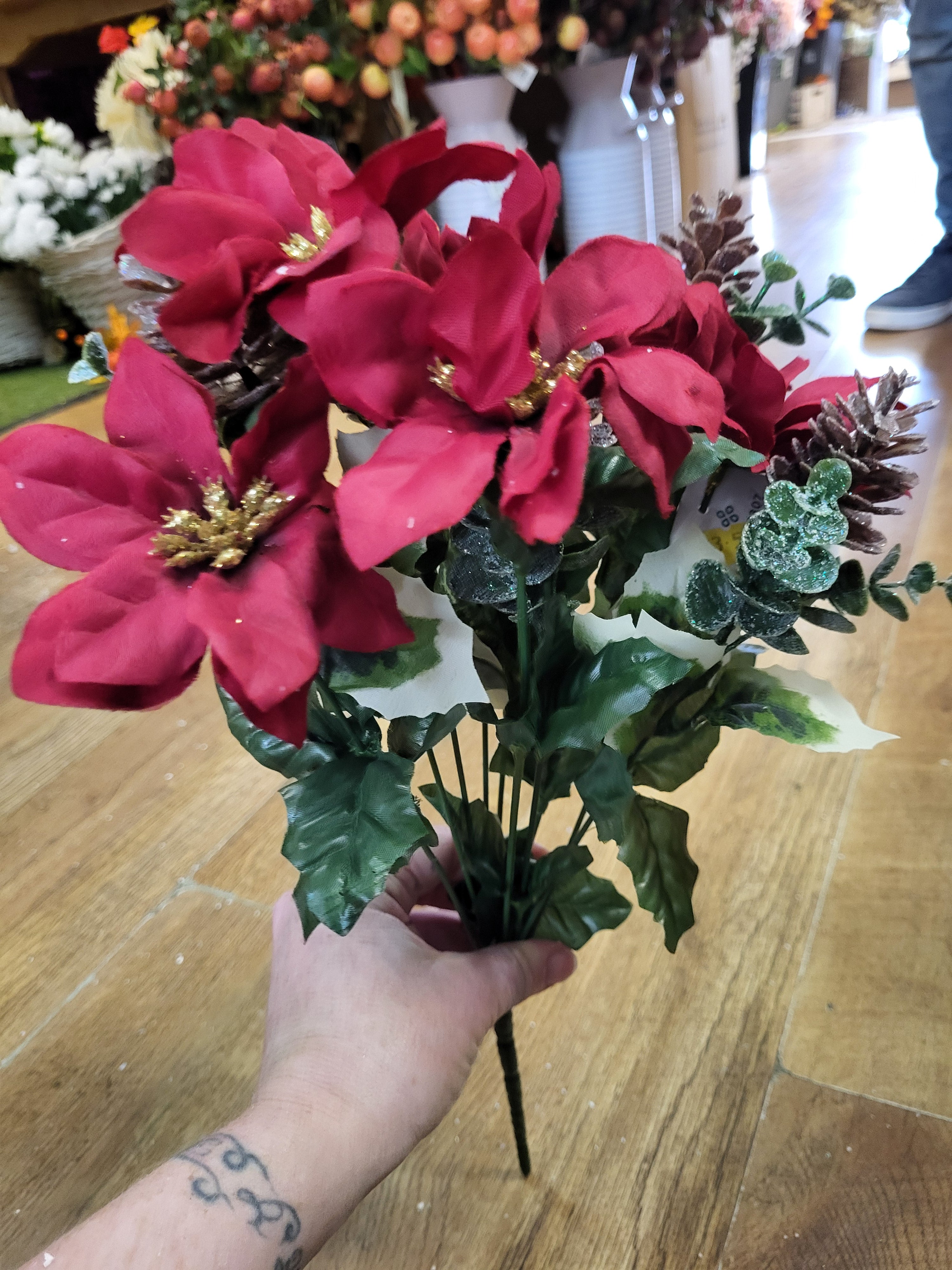 Red poinsettia and frosted cone bunch  image 2