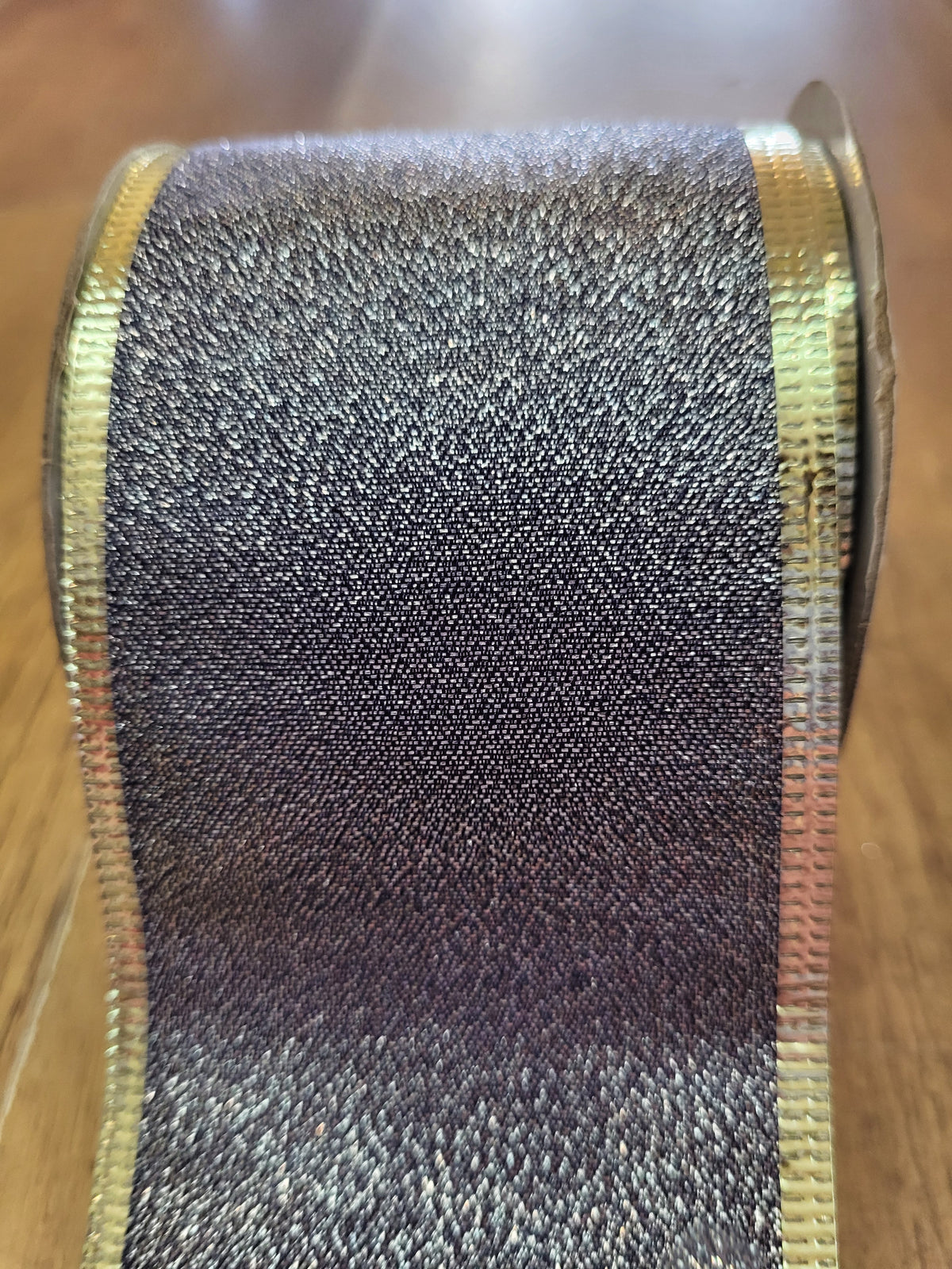 2.7m approx. roll of navy/champagne gold shimmery wired ribbon image 1