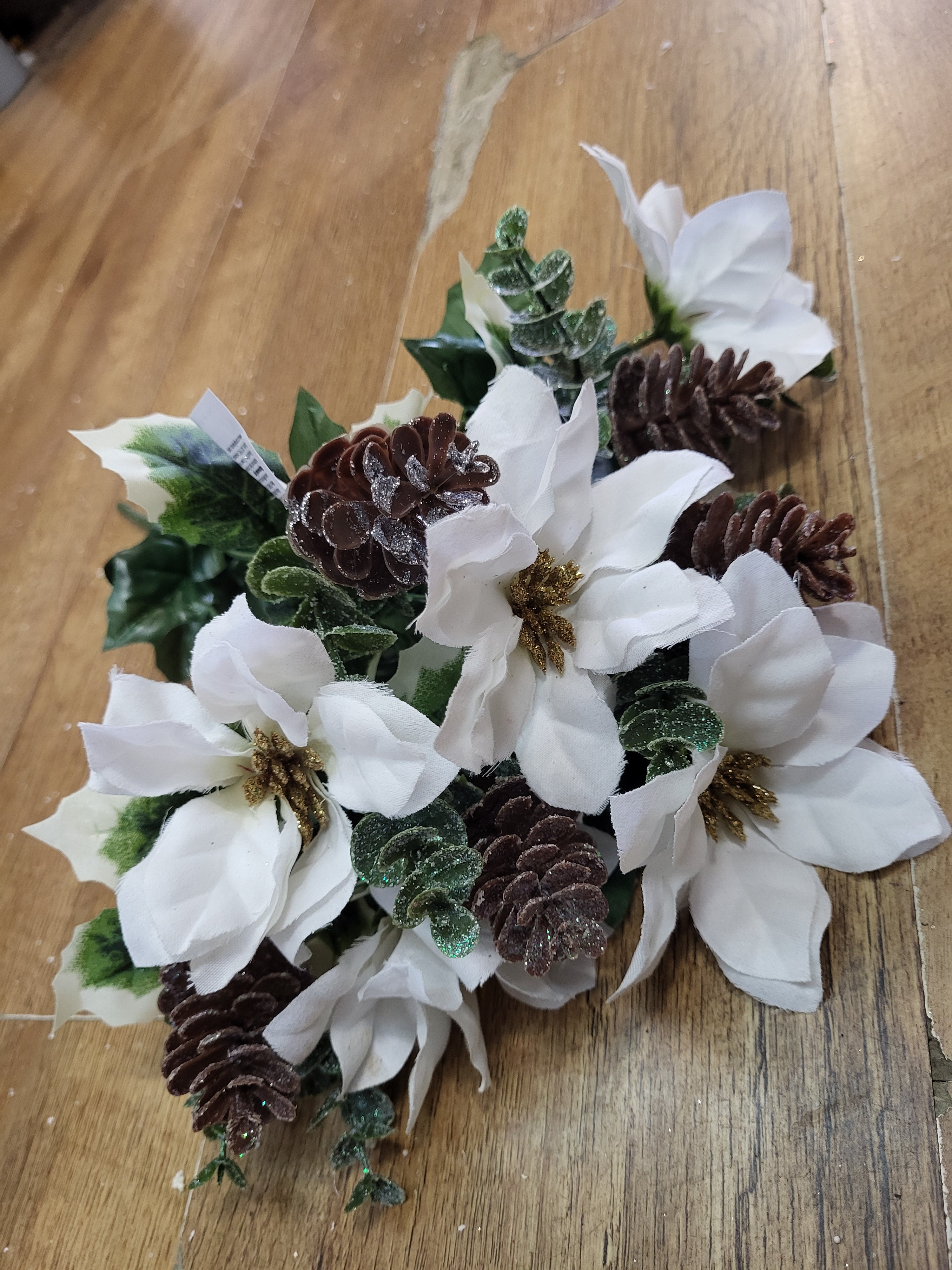 White poinsettia and frosted cone bunch image 0