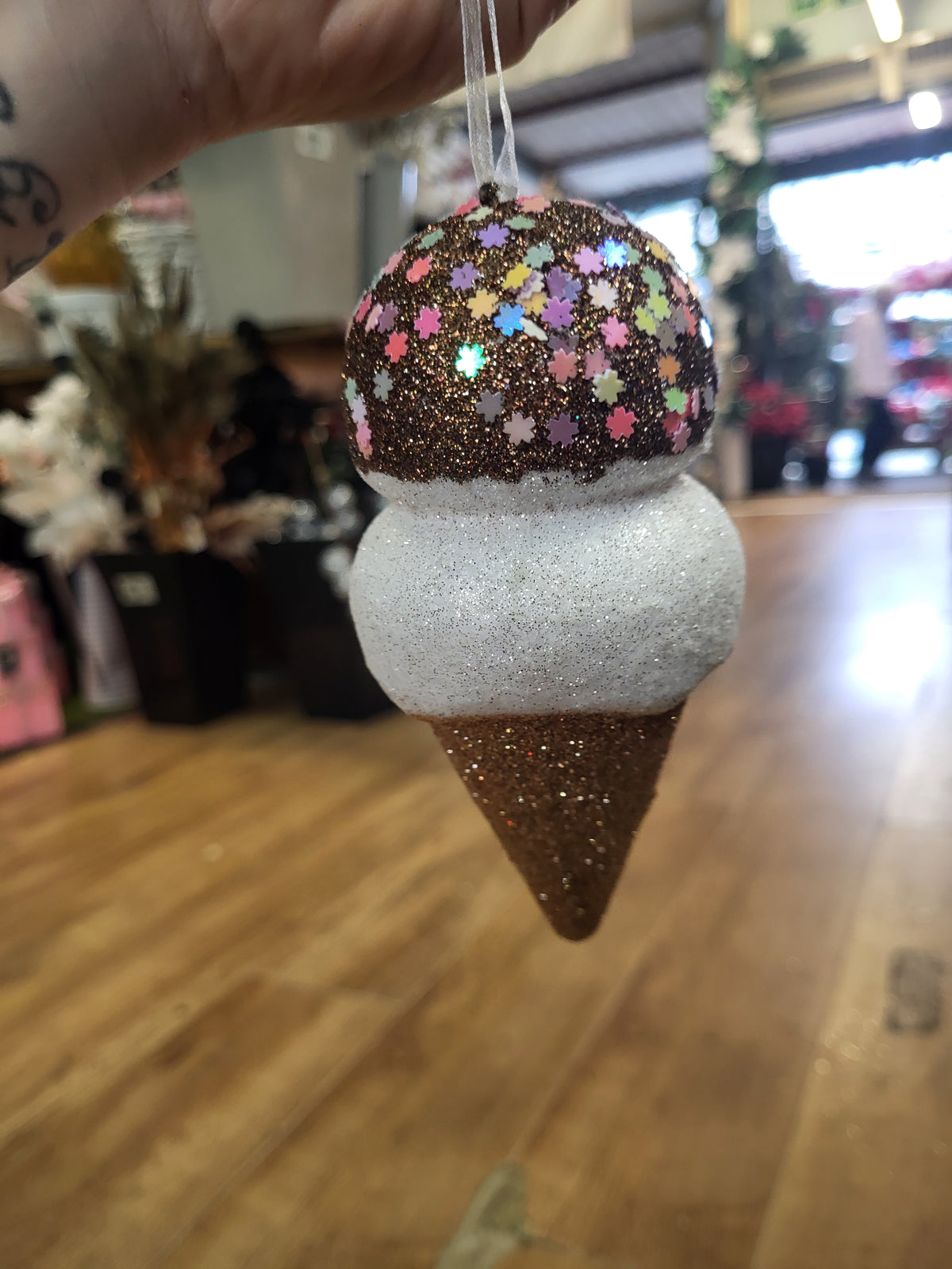 Small chocolate glitter and sprinkled icecream image 0