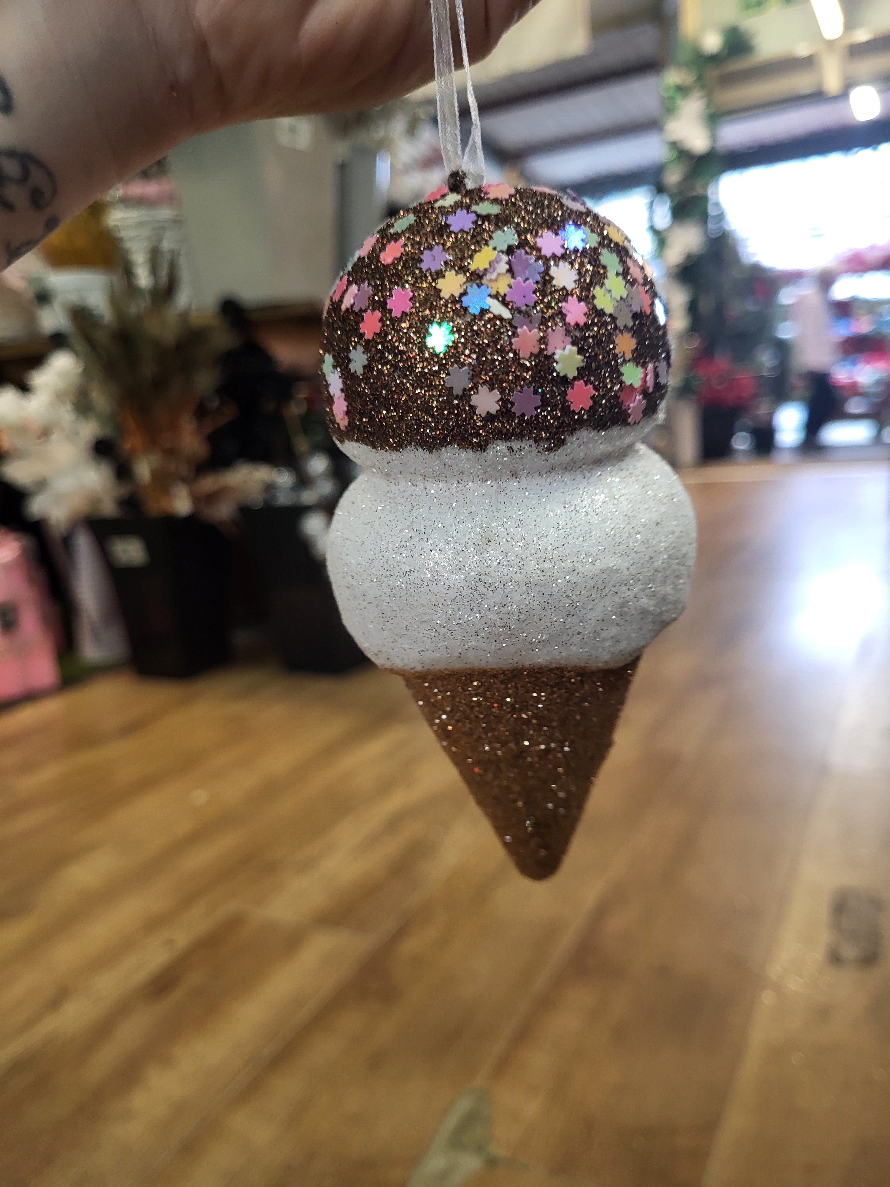 Small chocolate glitter and sprinkled icecream image 0