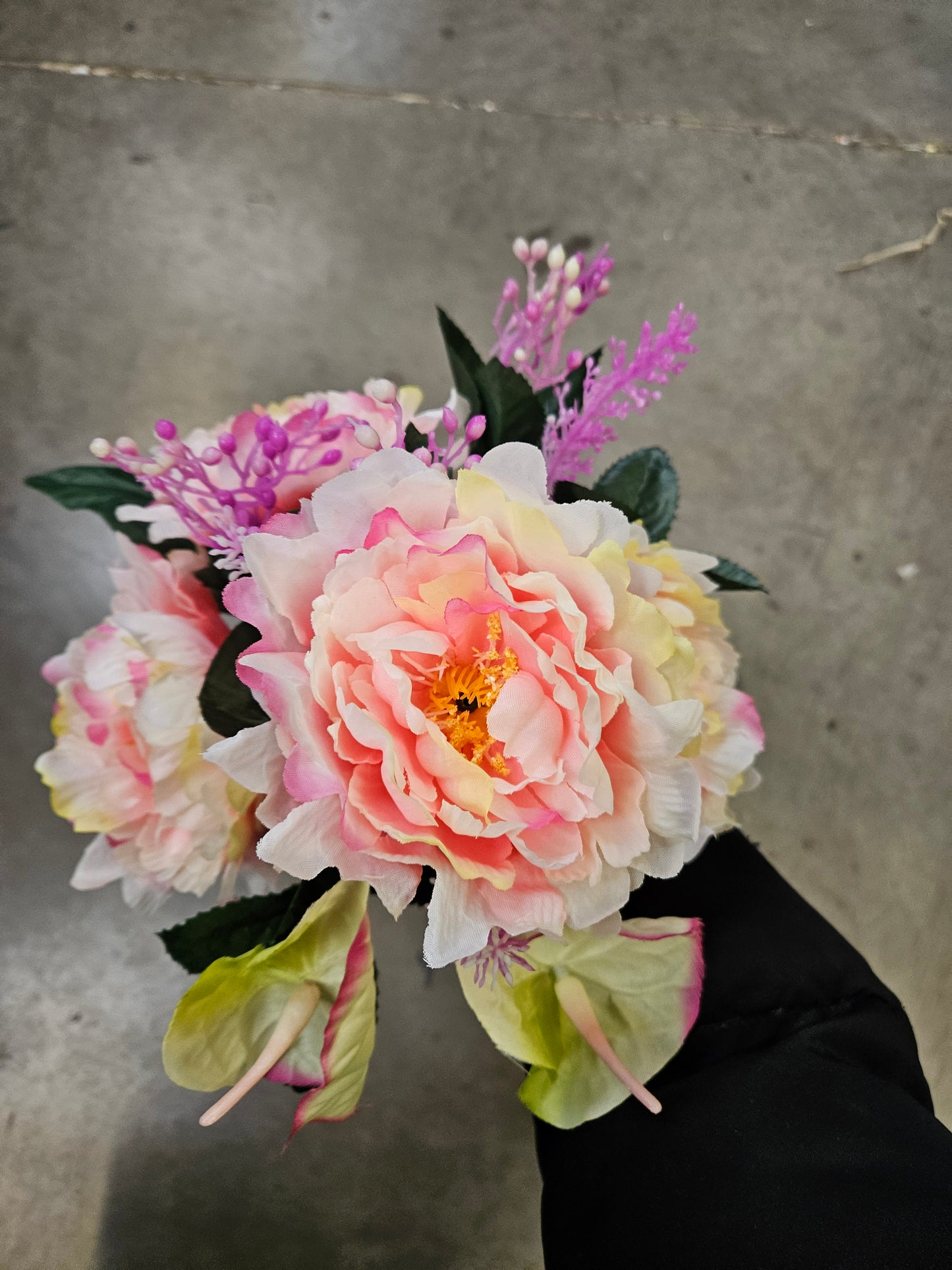 Mixed pink frilly peony and anthurium bouquet