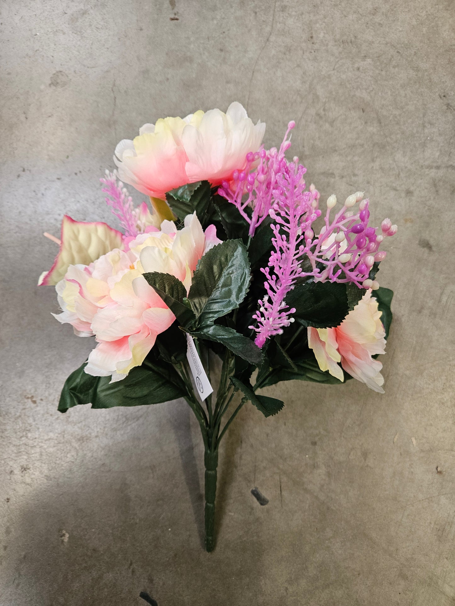 Mixed pink frilly peony and anthurium bouquet